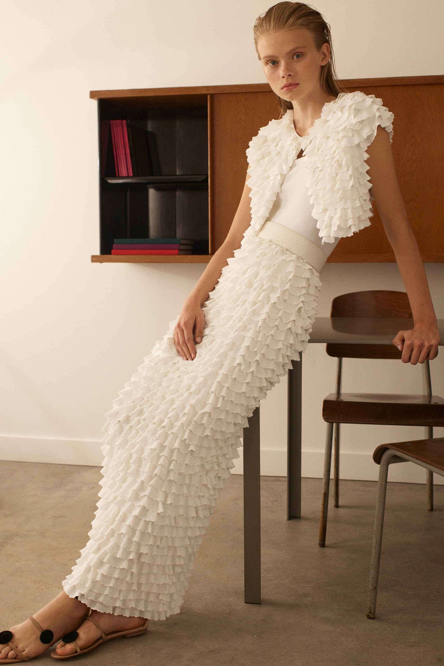 white pleated top and skirt