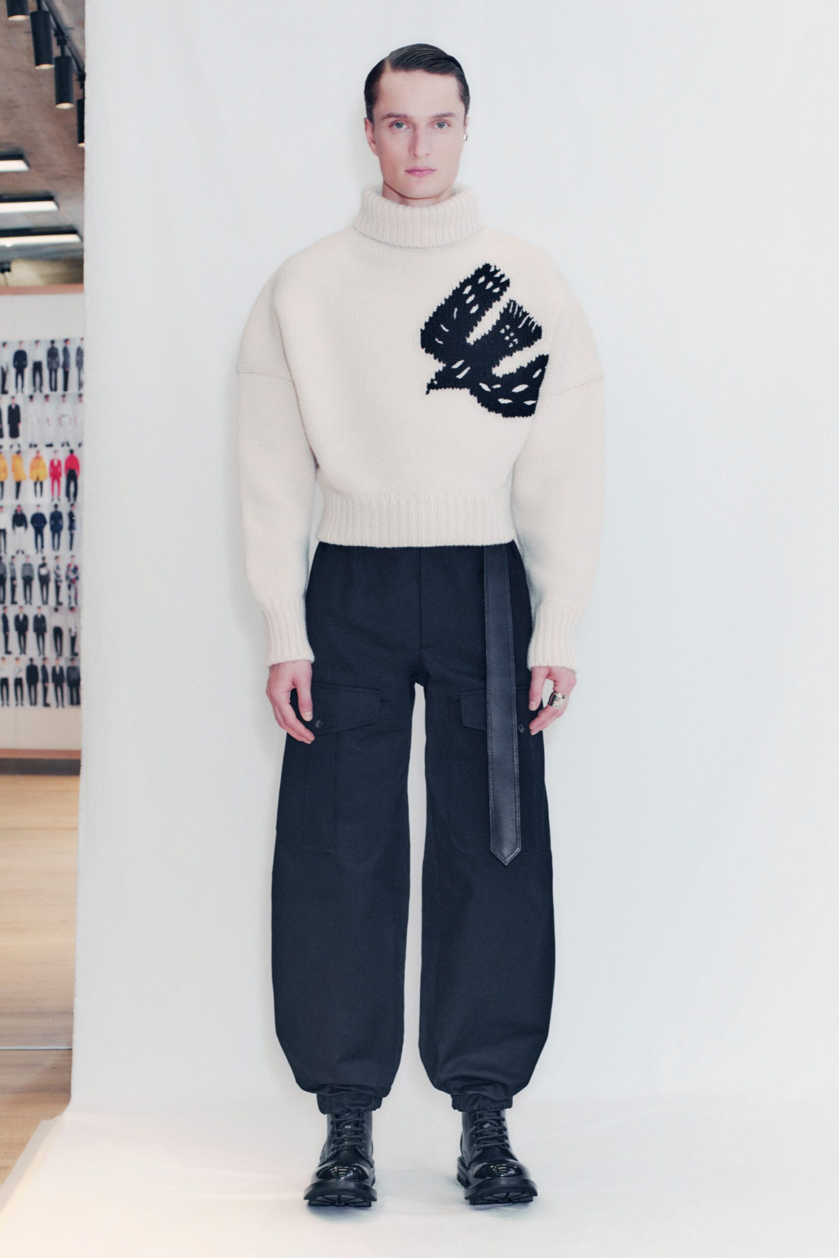 white oversized sweater and black cargo pants