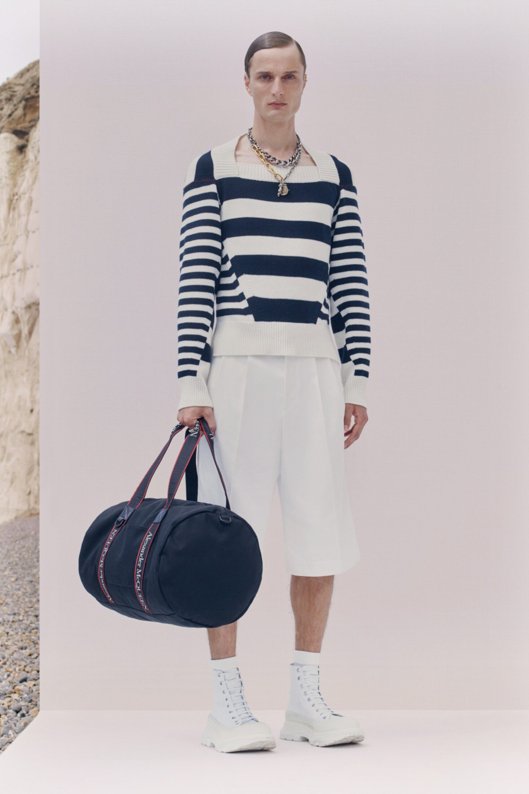striped sweater and white shorts