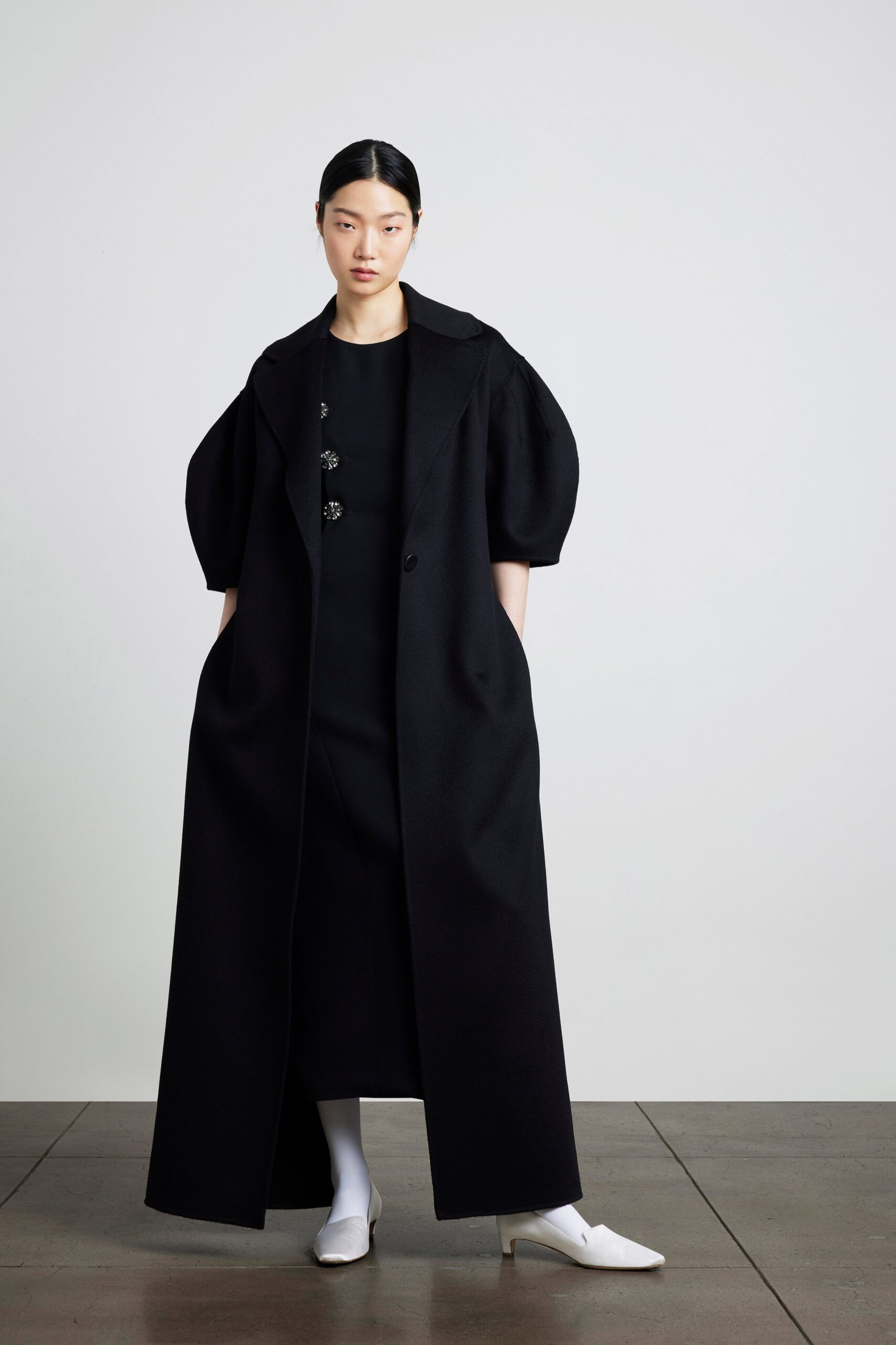 black wool coat and dress