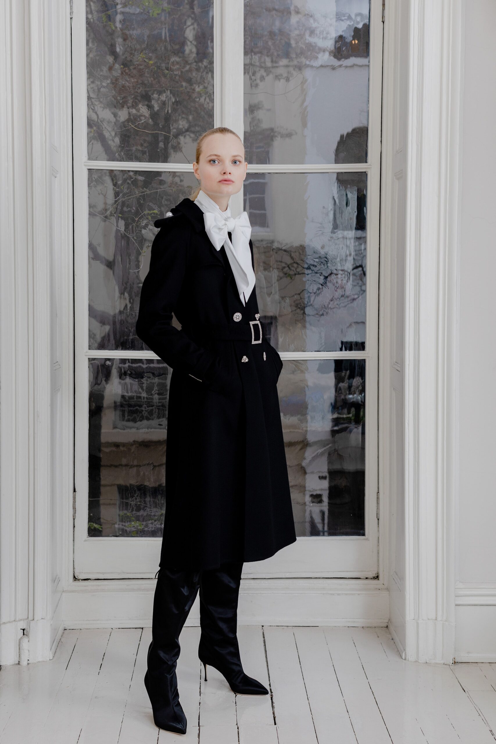 black wool coat with white blouse