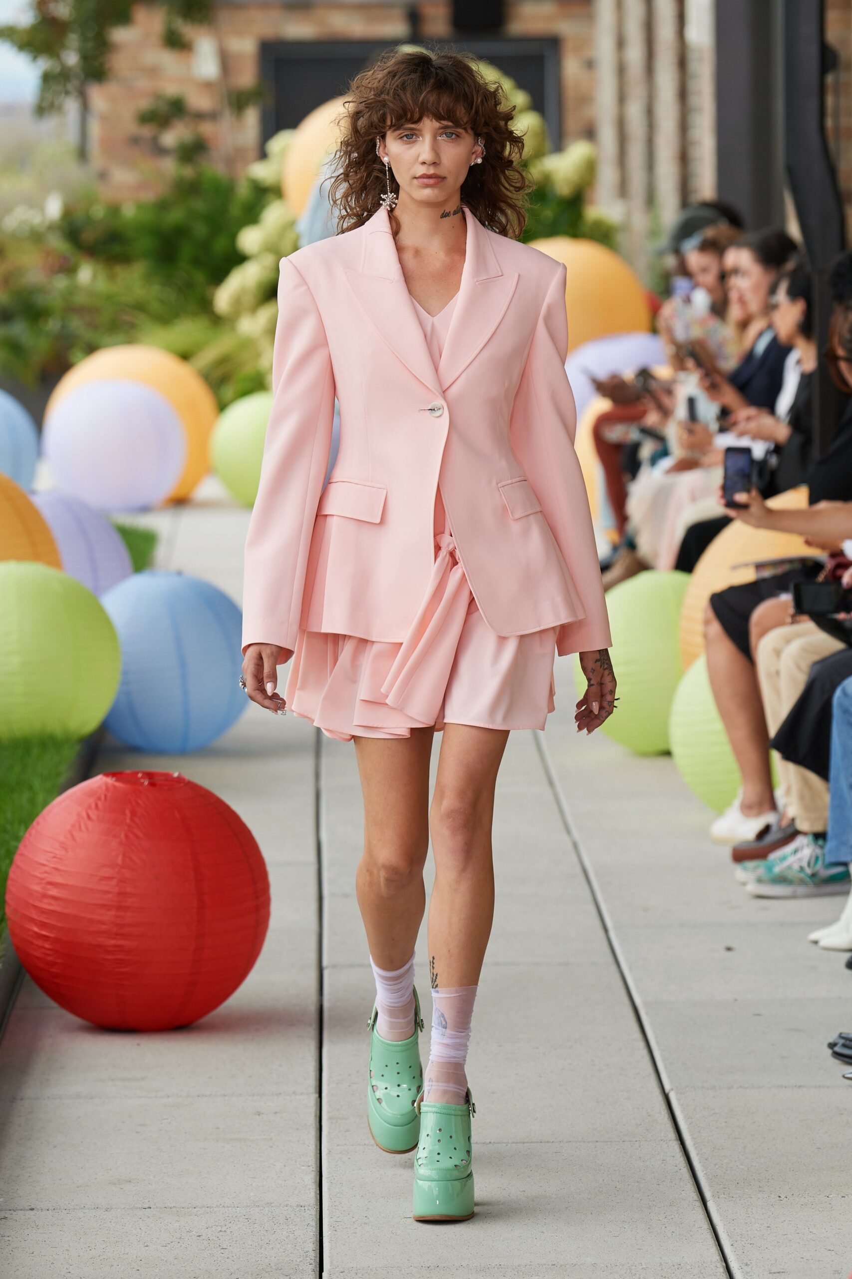 pink oversized blazer with pleated skirt
