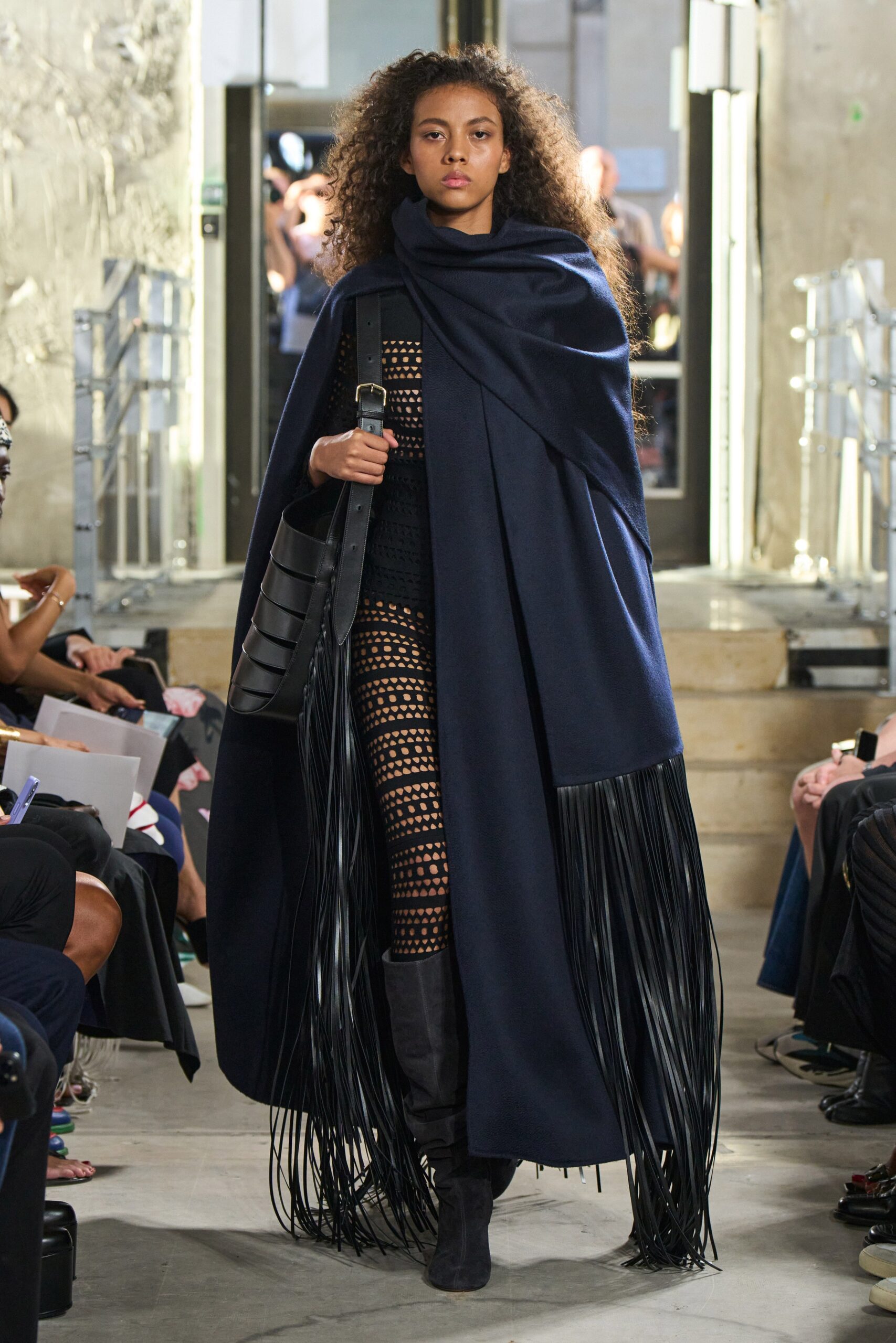 navy wool cape with black catsuit