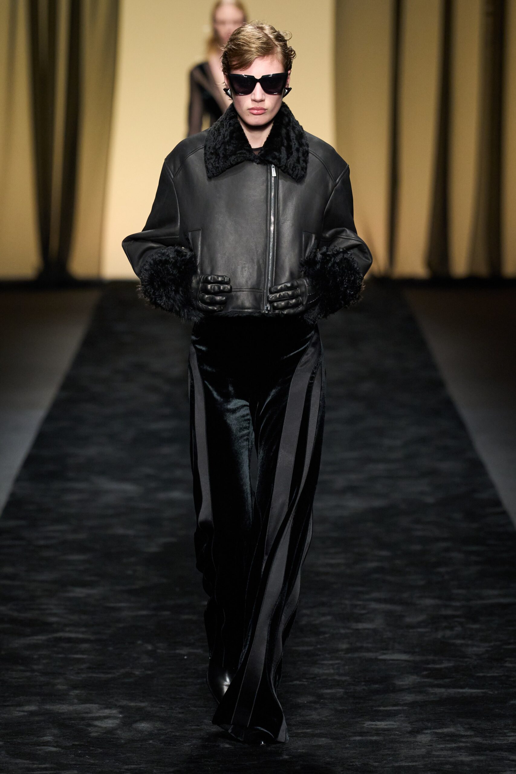 black leather jacket and silk pants