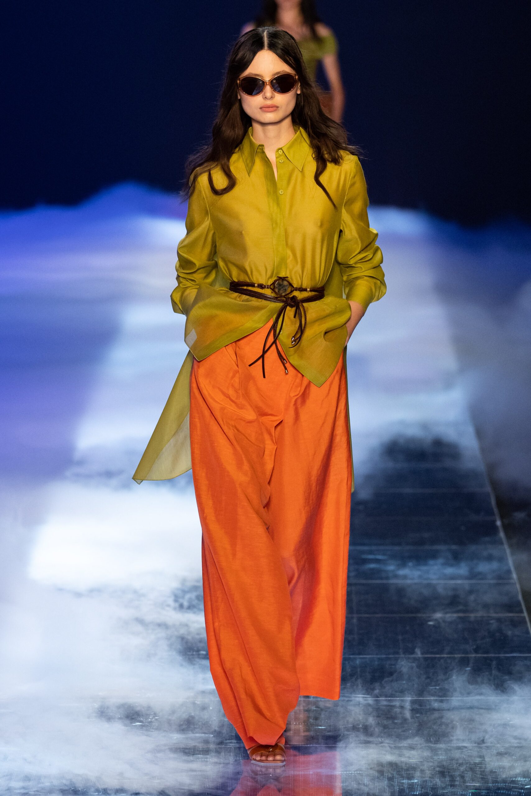 green shirt orange pants outfit