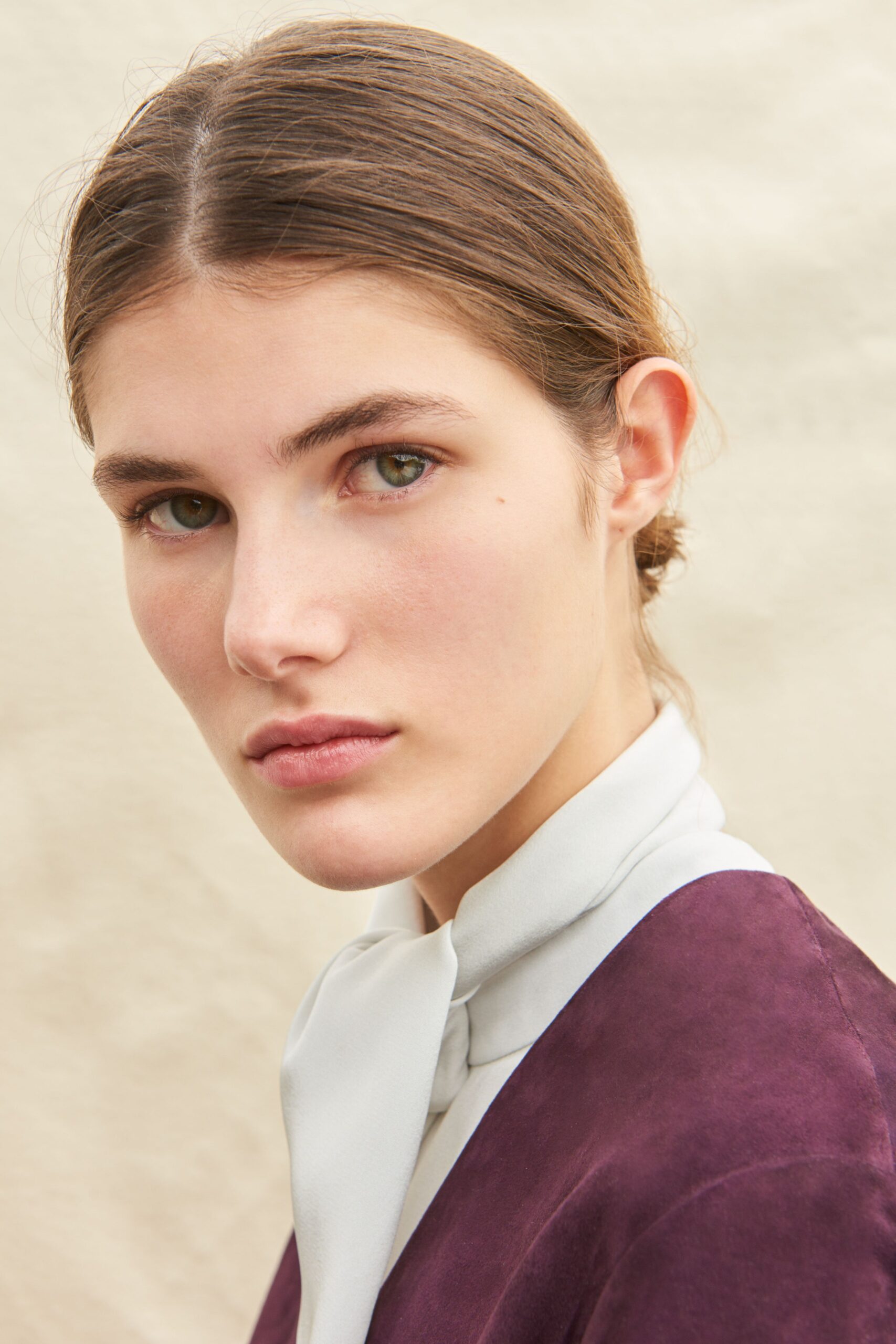 fitted white silk blouse and purple suede dress