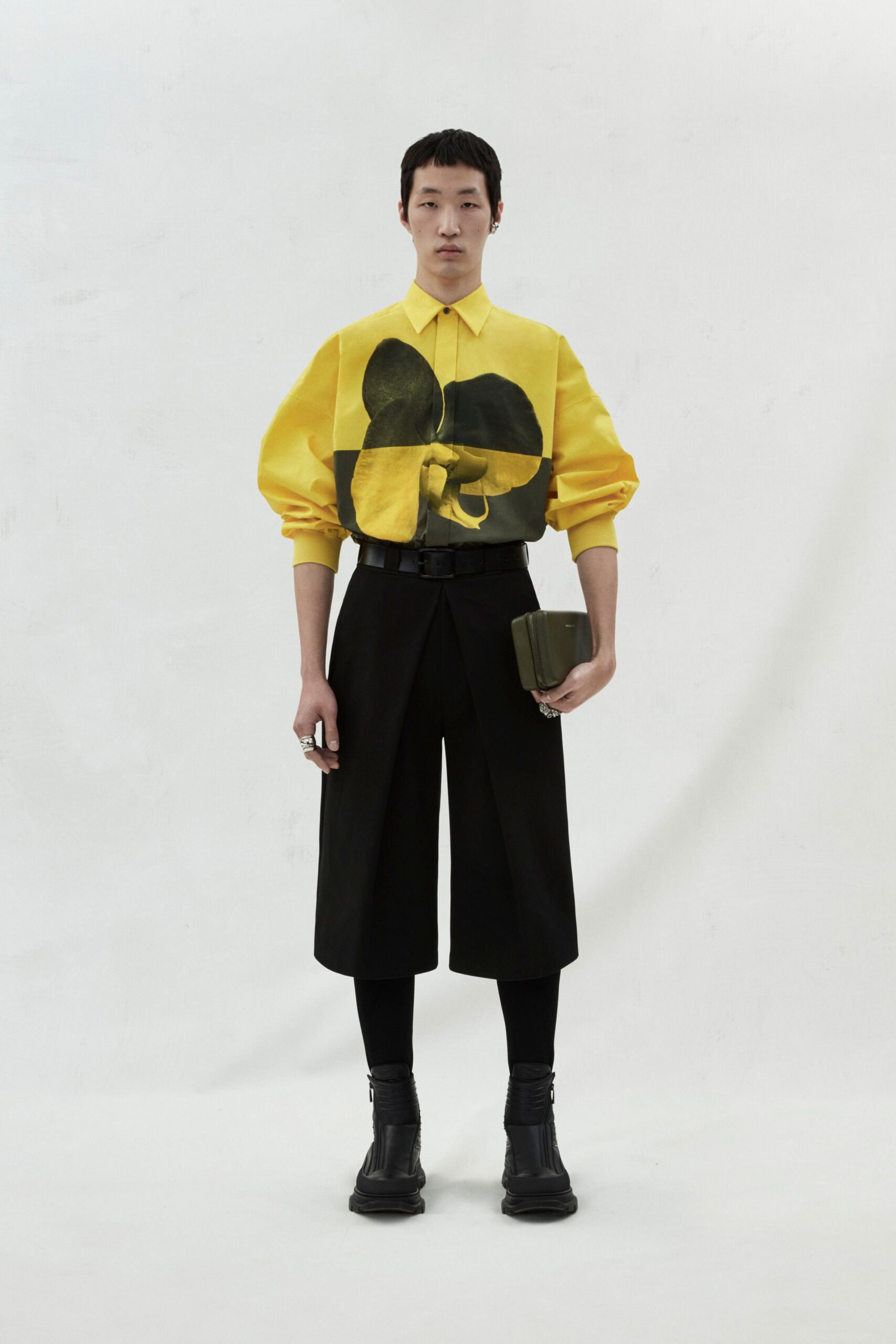 yellow printed shirt with black pants