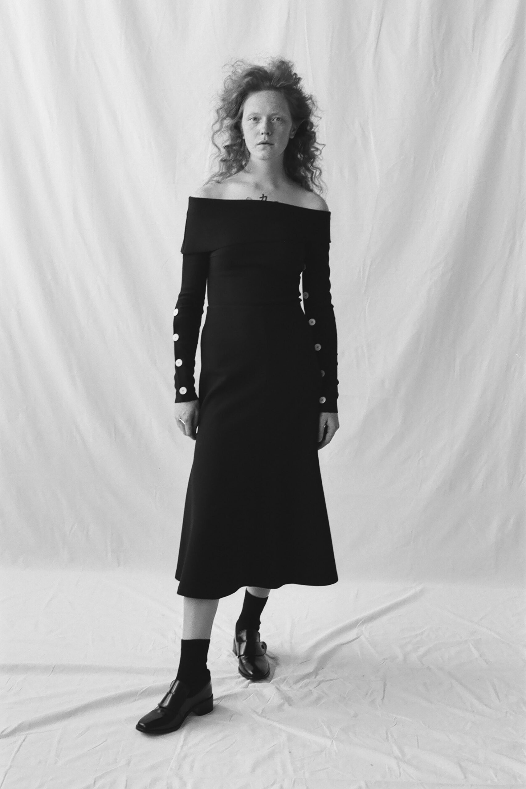 black off-shoulder midi dress