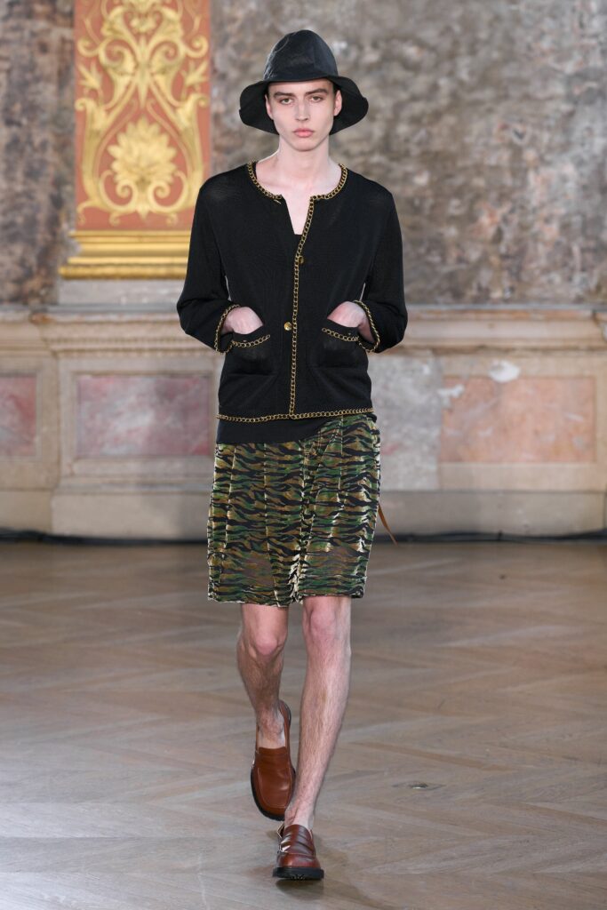 black velvet jacket with camouflage mini skirt