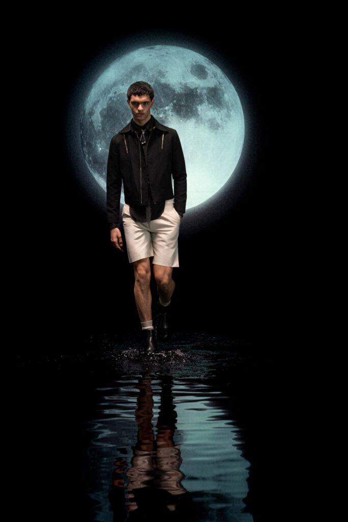 black fitted jacket and white shorts