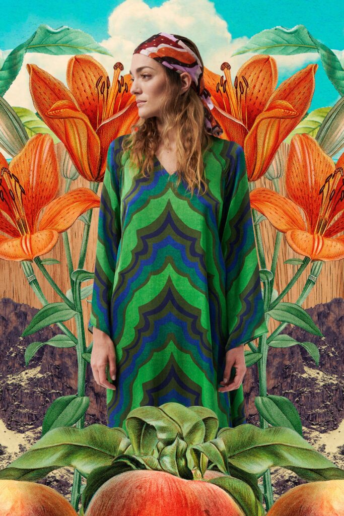 A relaxed green printed long-sleeve dress with a V-neckline and vibrant patterns.
