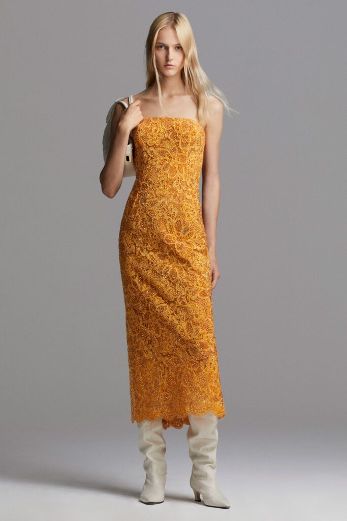 yellow lace midi dress with white boots