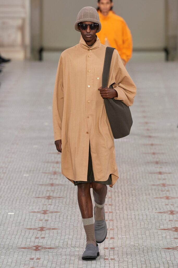 beige shirt-dress with brown shorts