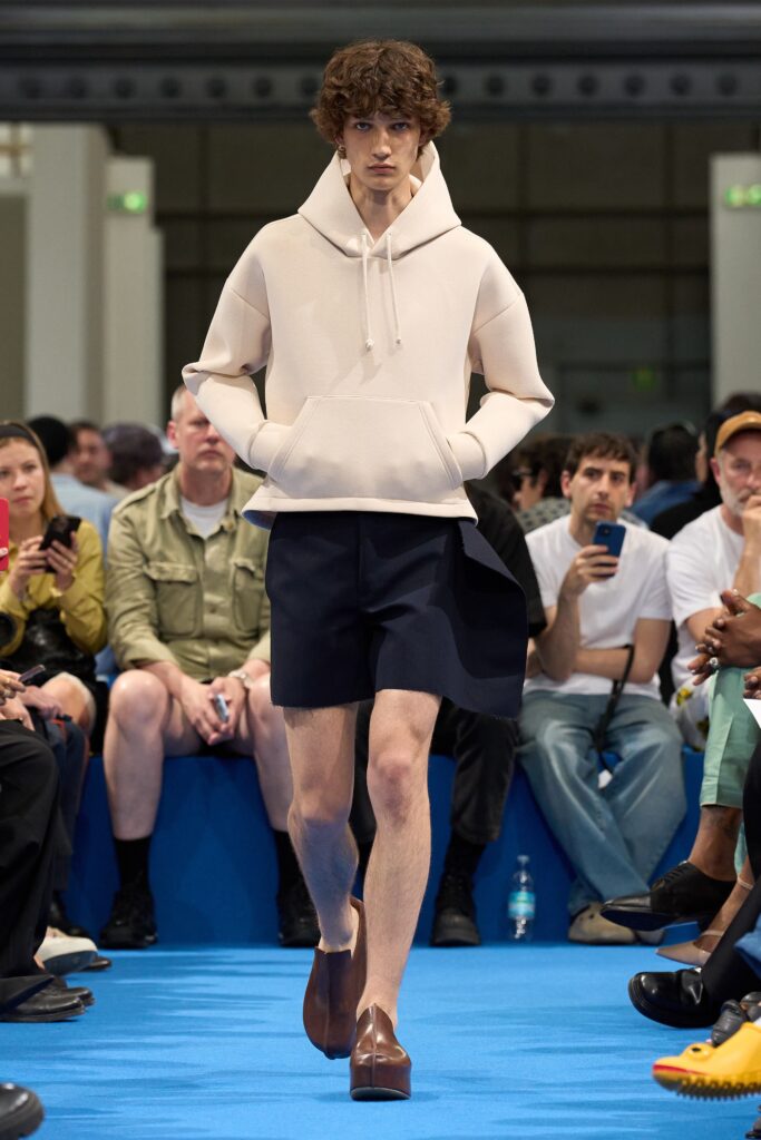 beige hoodie navy shorts