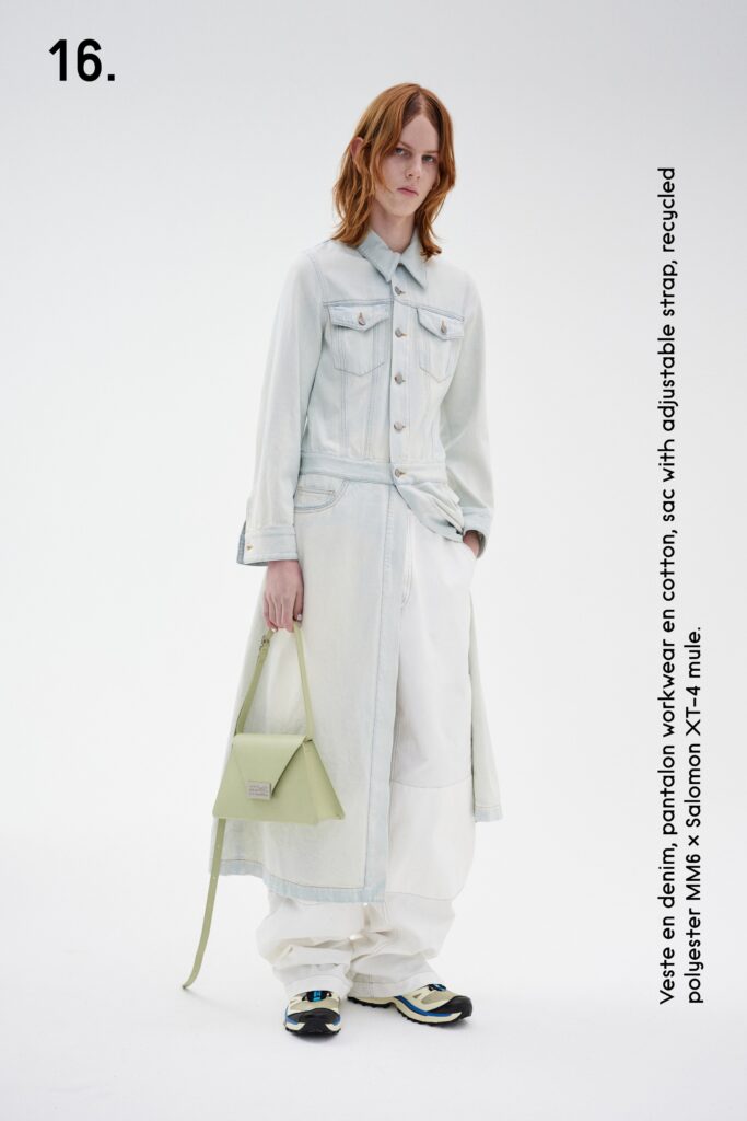 A relaxed blue denim long-sleeve dress with a collared neckline and buttoned tiered design.