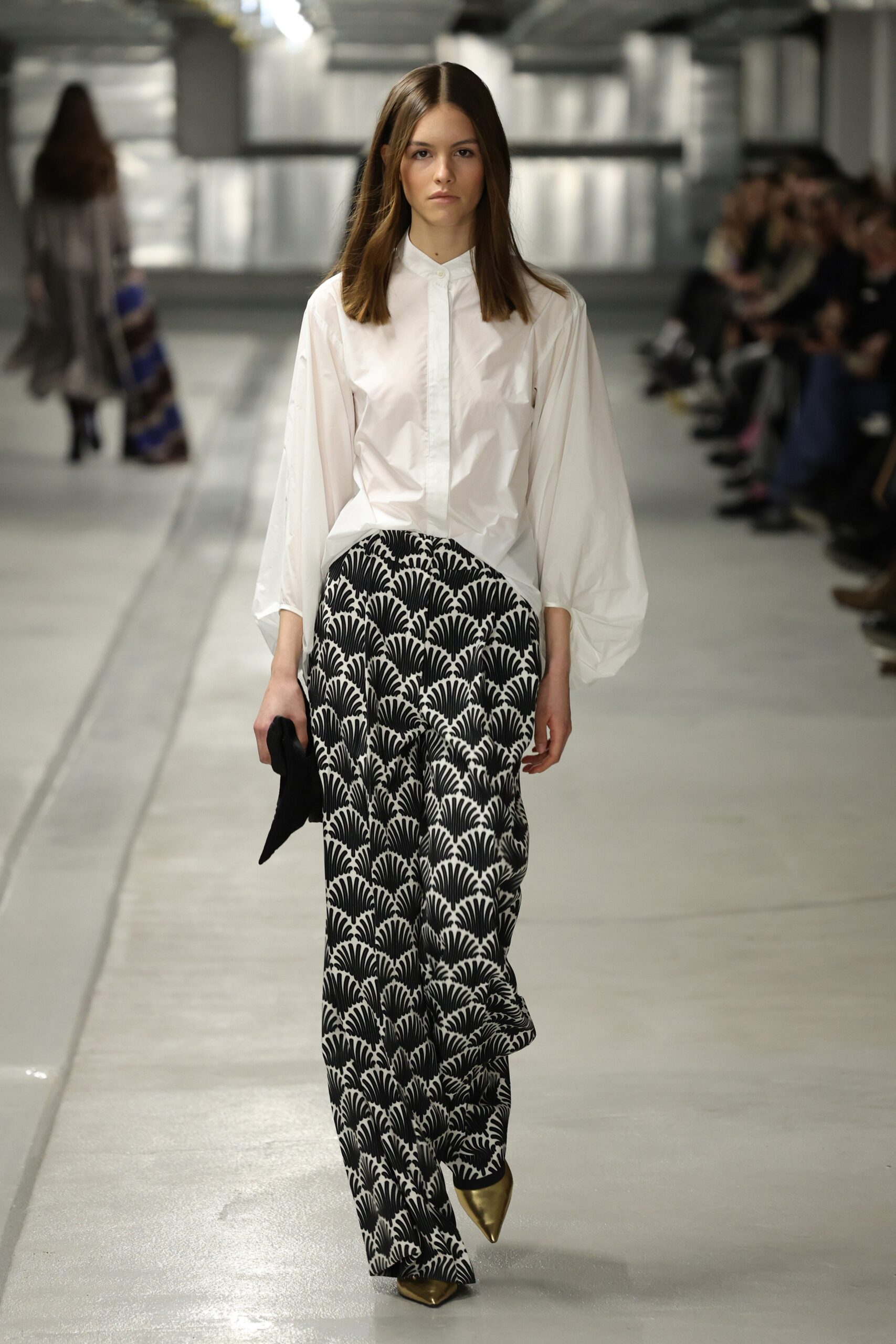 white relaxed shirt with printed pants