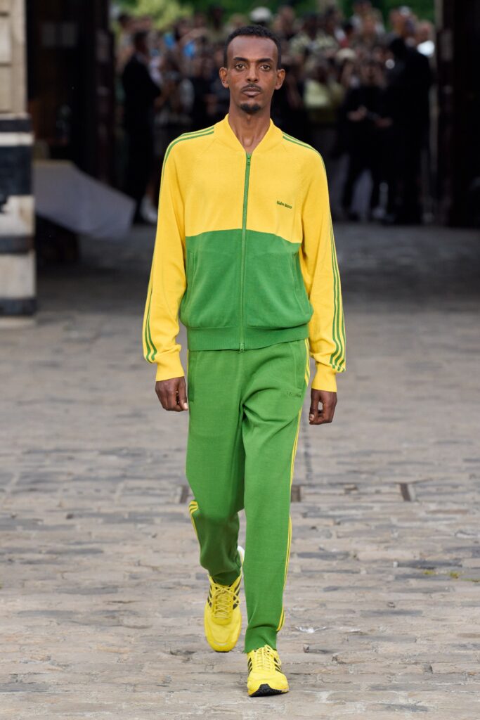 A relaxed-fit yellow and green striped tracksuit with a collared long-sleeve jacket.