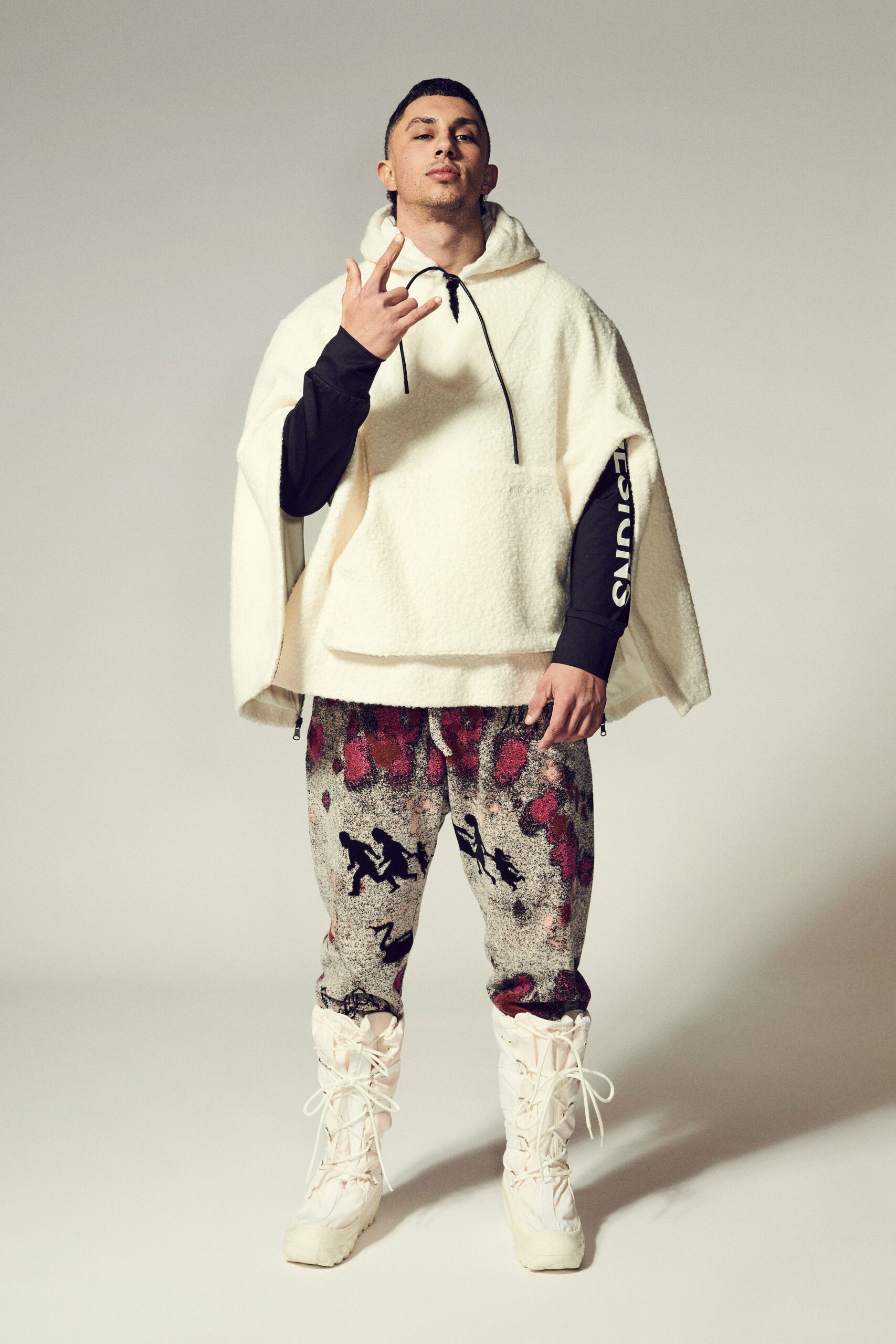 white wool poncho with printed pants