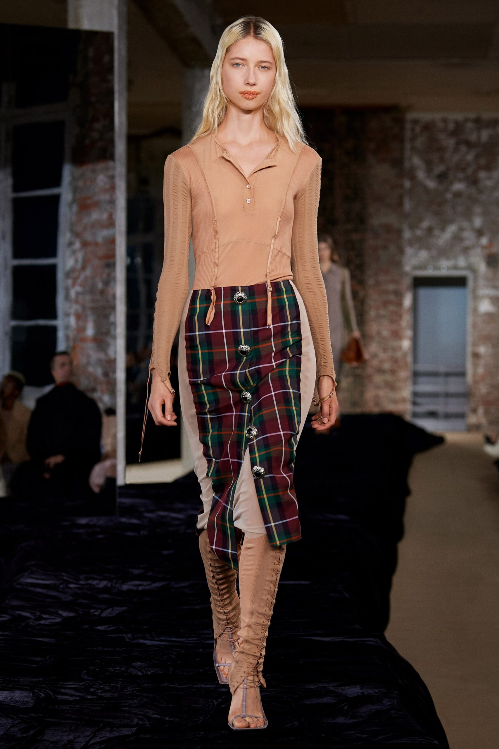 beige fitted top with multi plaid pants