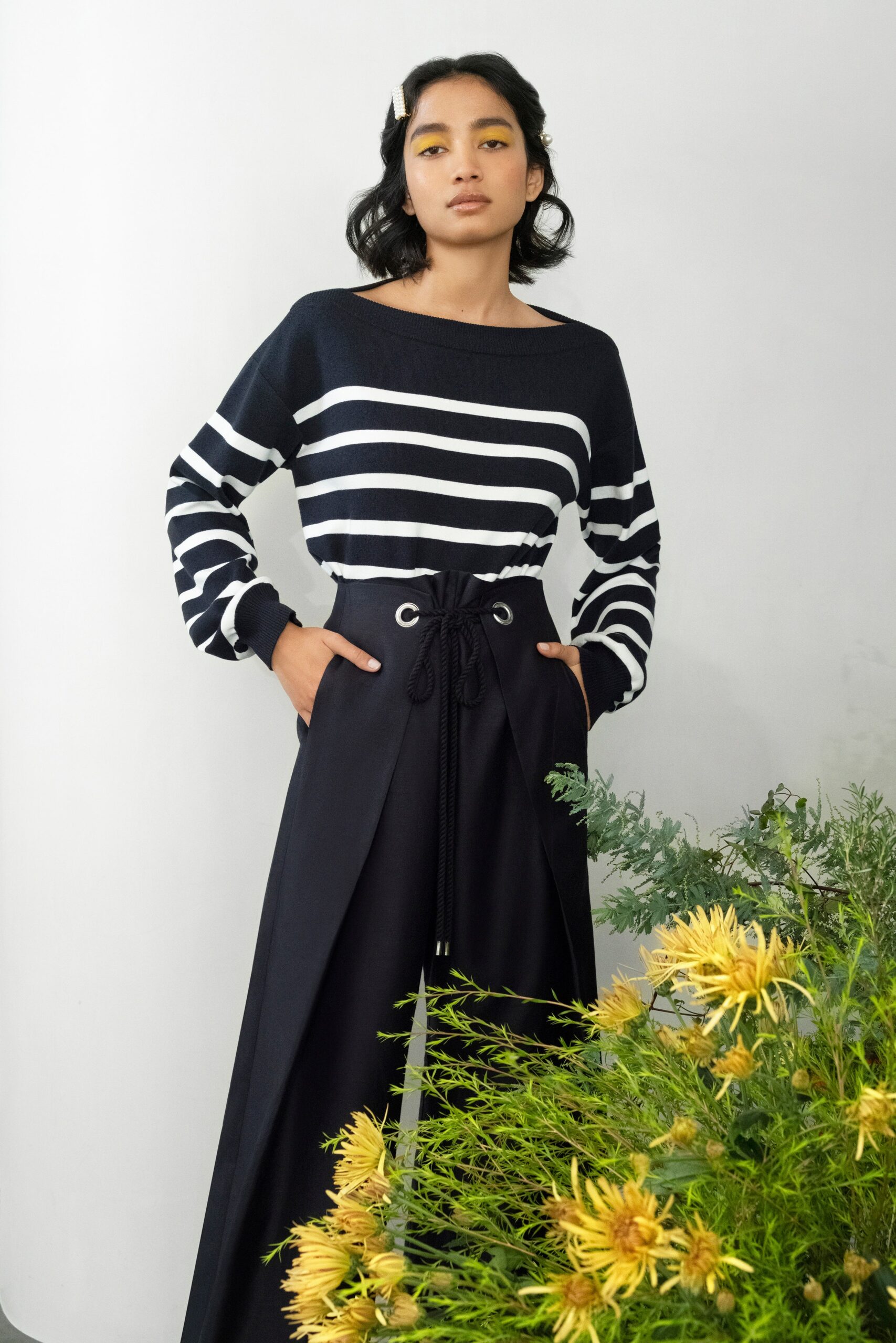 black and white striped sweater with wide-leg pants