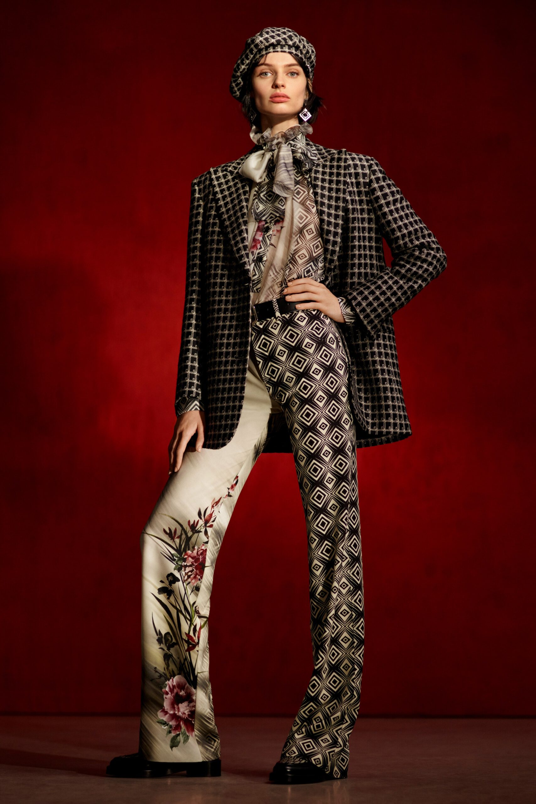 tailored black and white blazer with printed pants