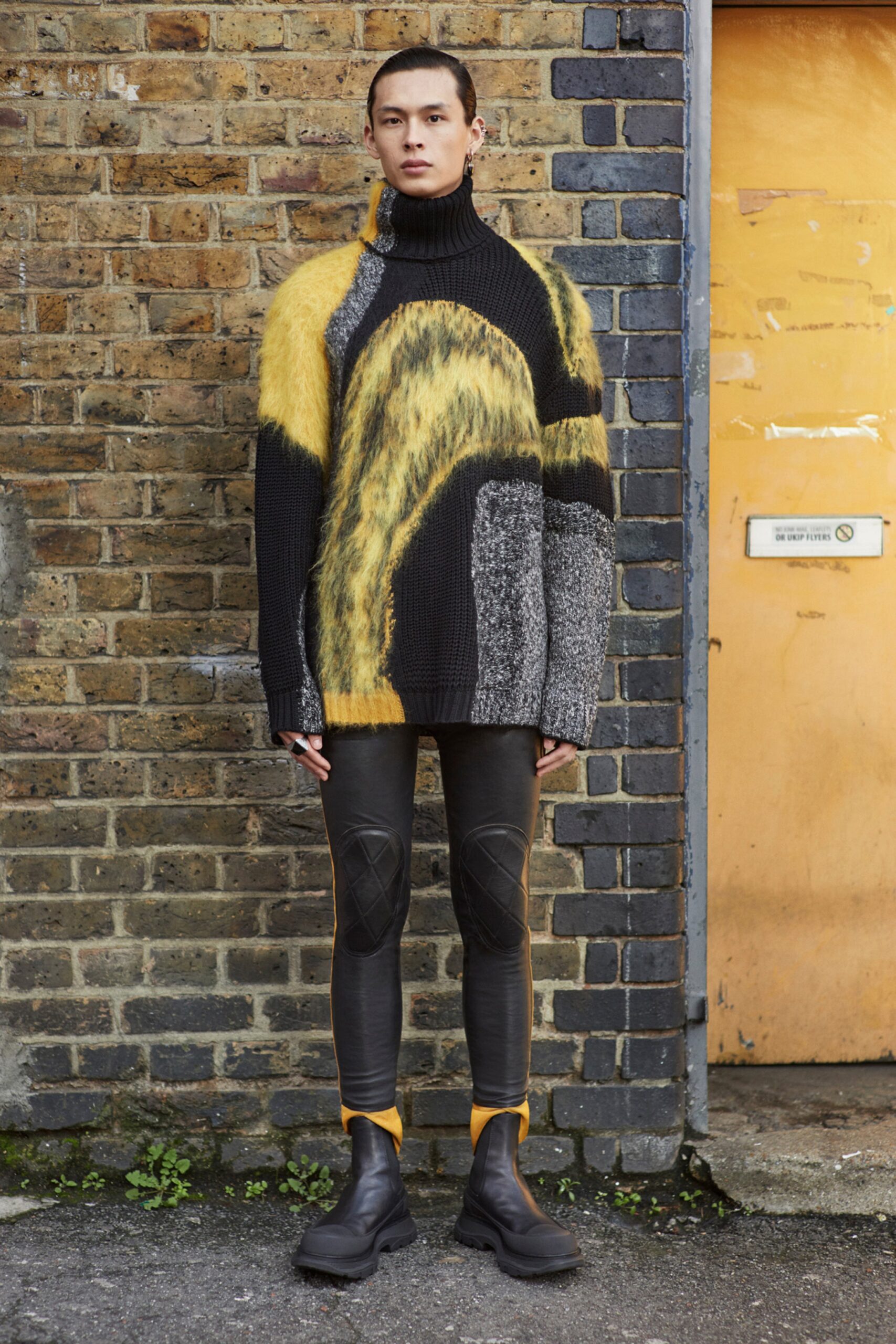 black wool long-sleeve turtleneck oversized draped sweater