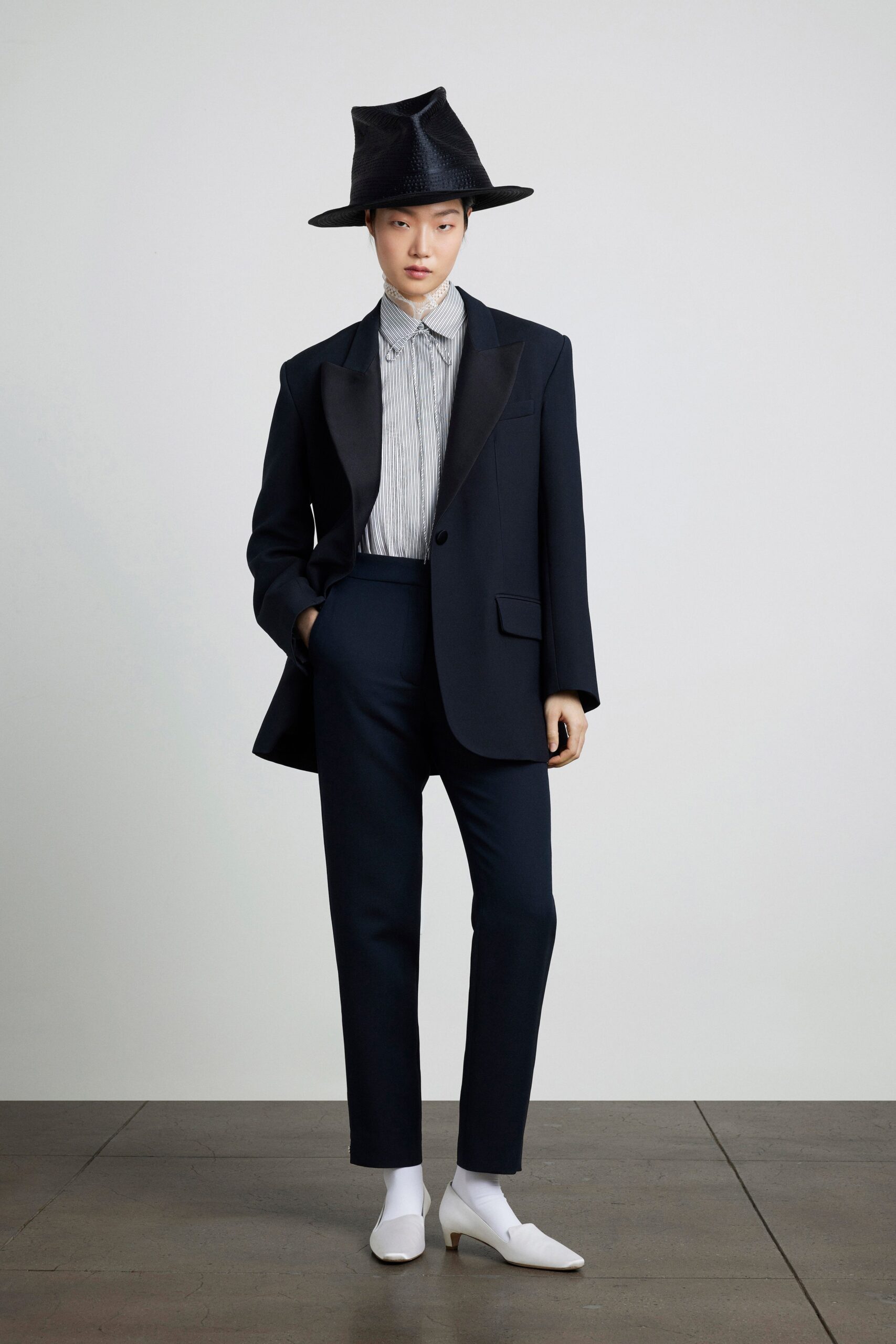 black tailored blazer with shirt and pants
