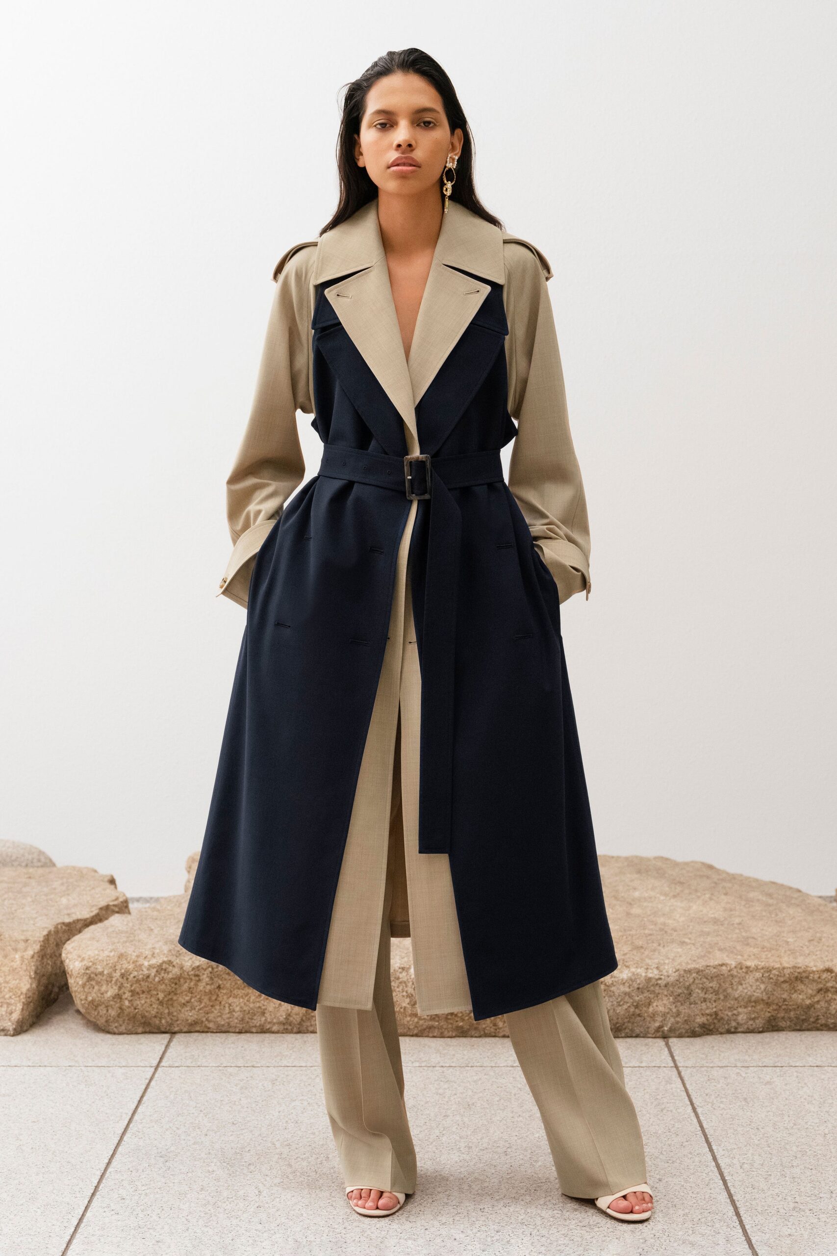 navy trench coat with beige shirt