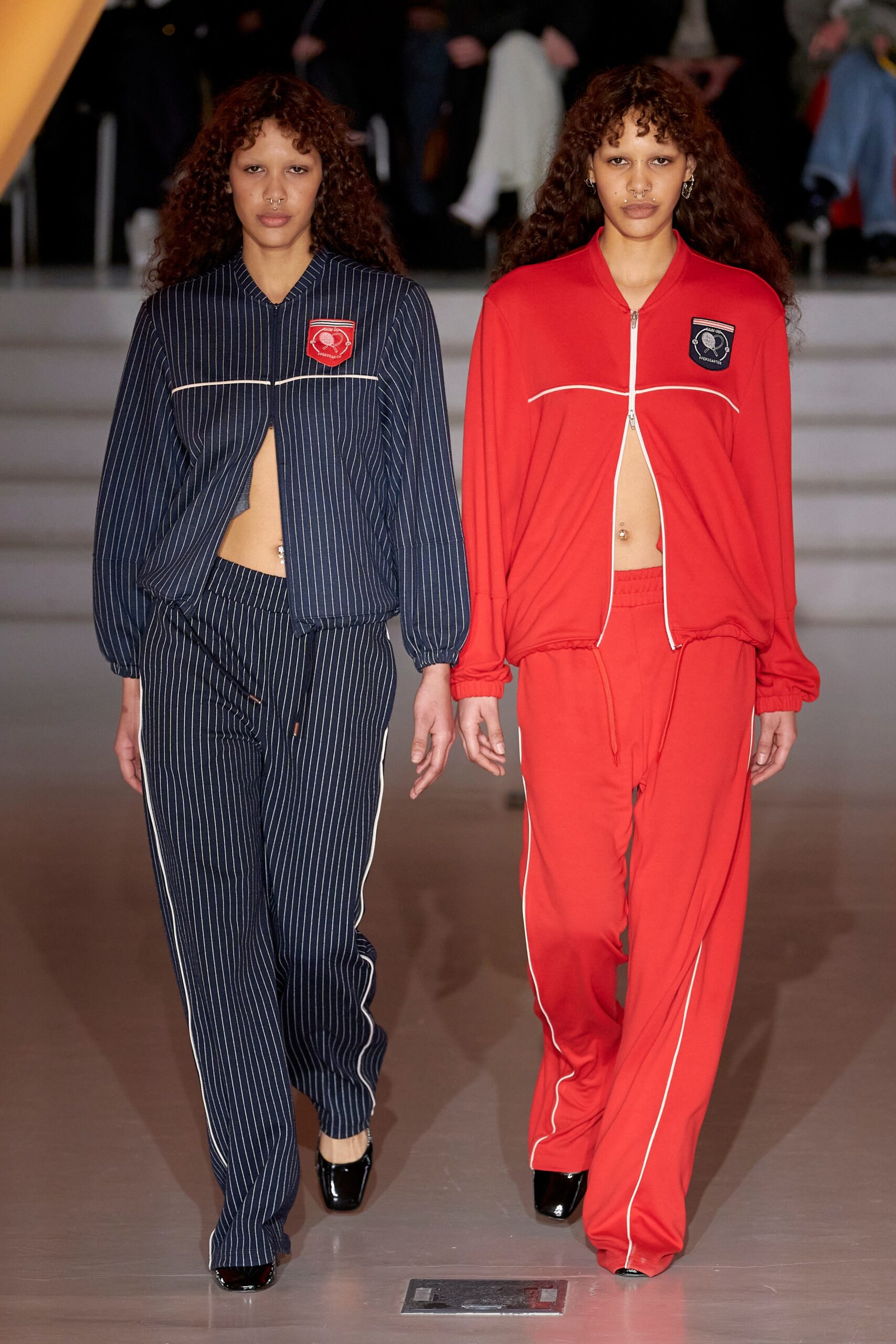 A relaxed-fit red and navy striped jacket paired with matching pants.