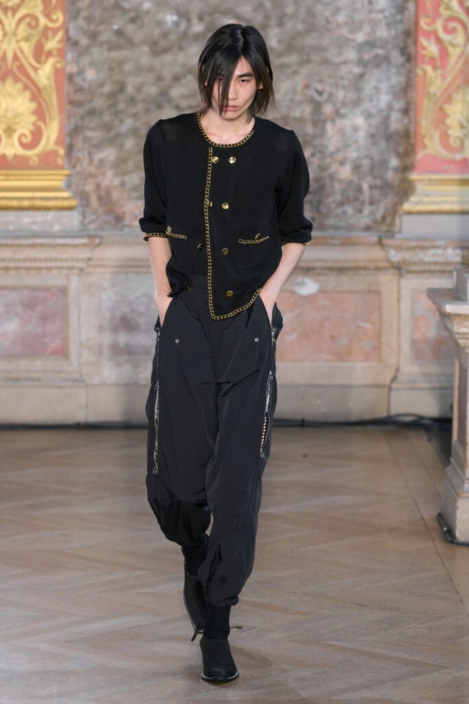 black fitted jacket and relaxed pants