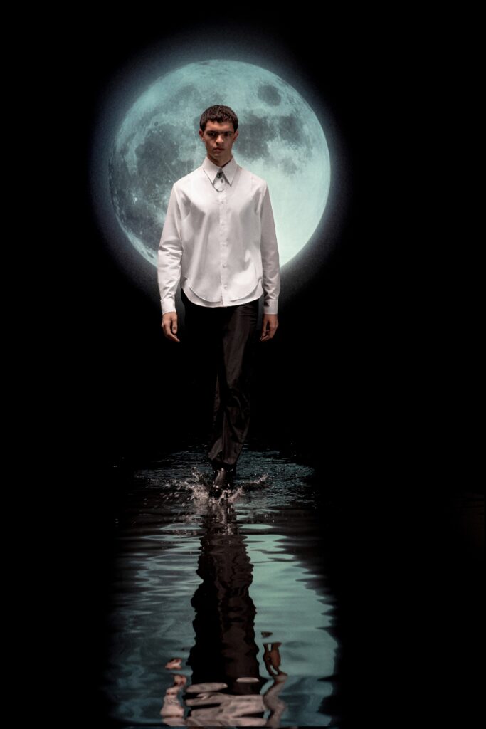 white fitted shirt and black pants