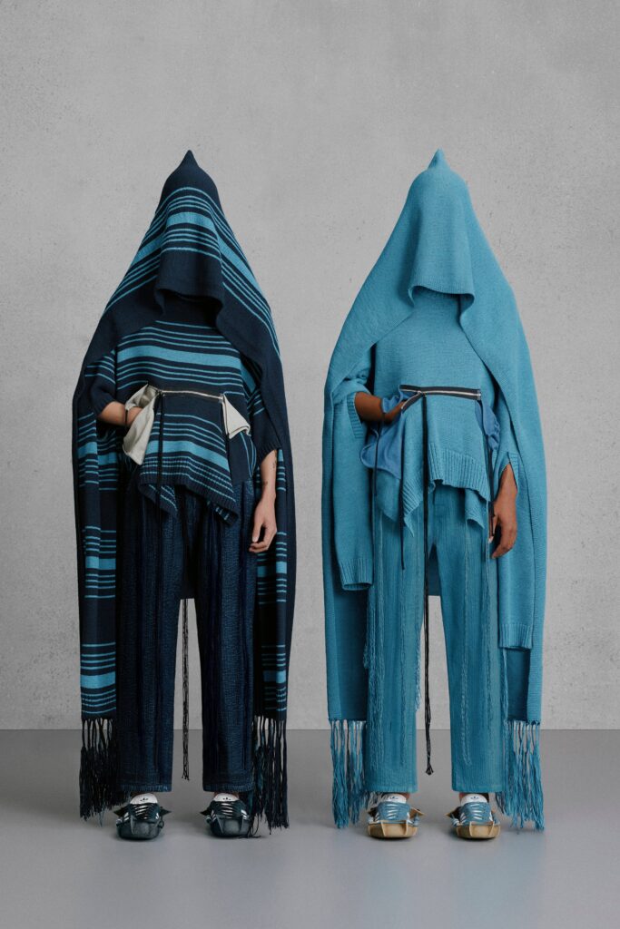 blue striped poncho with denim pants