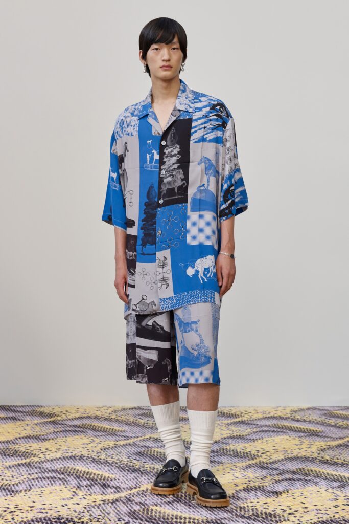 A relaxed-fit blue printed shirt with short sleeves paired with matching shorts.
