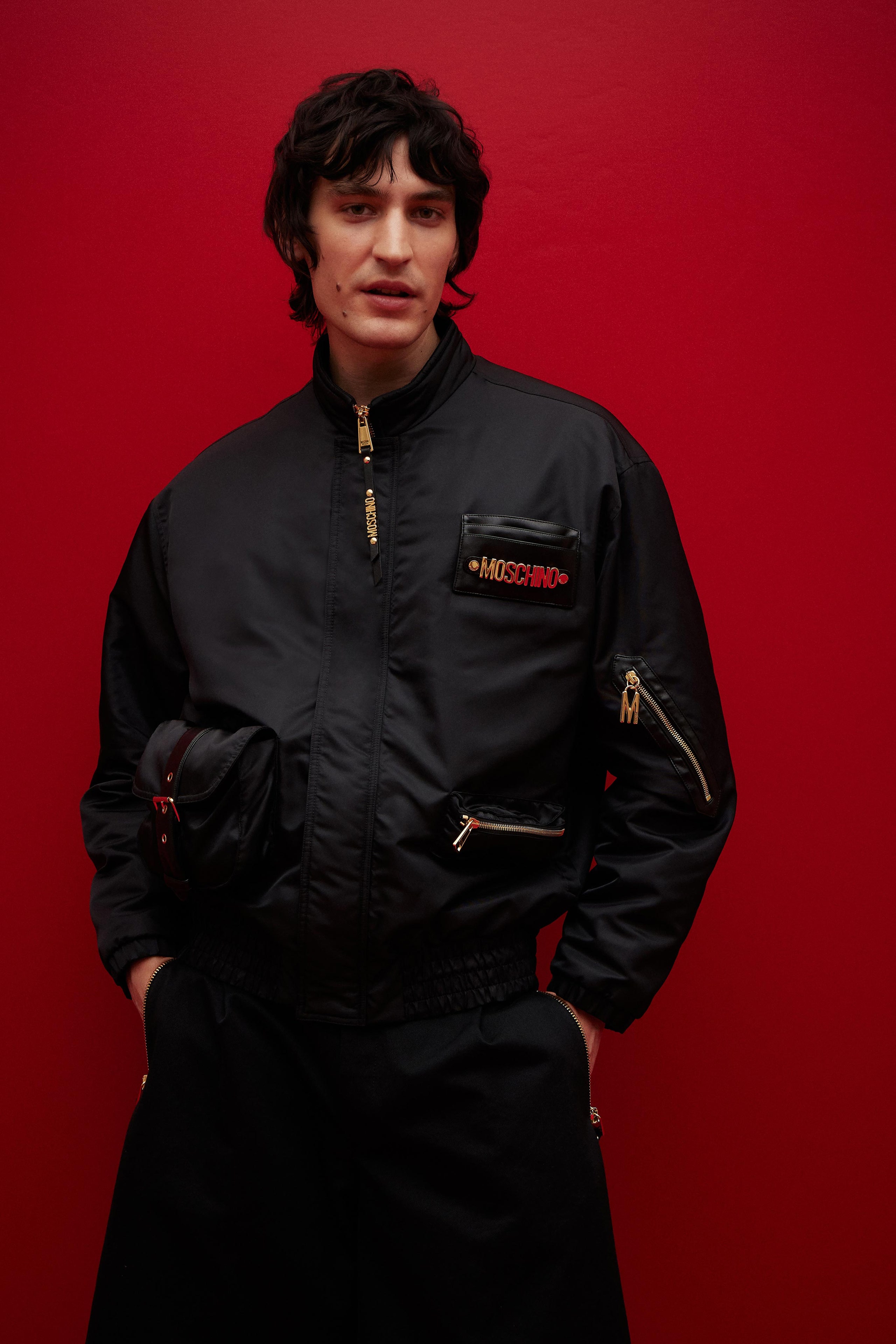 black vinyl fitted jacket and relaxed pants