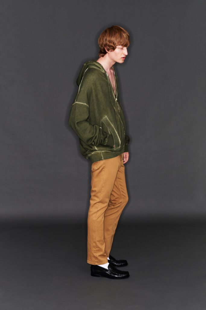 green oversized hoodie with beige pants