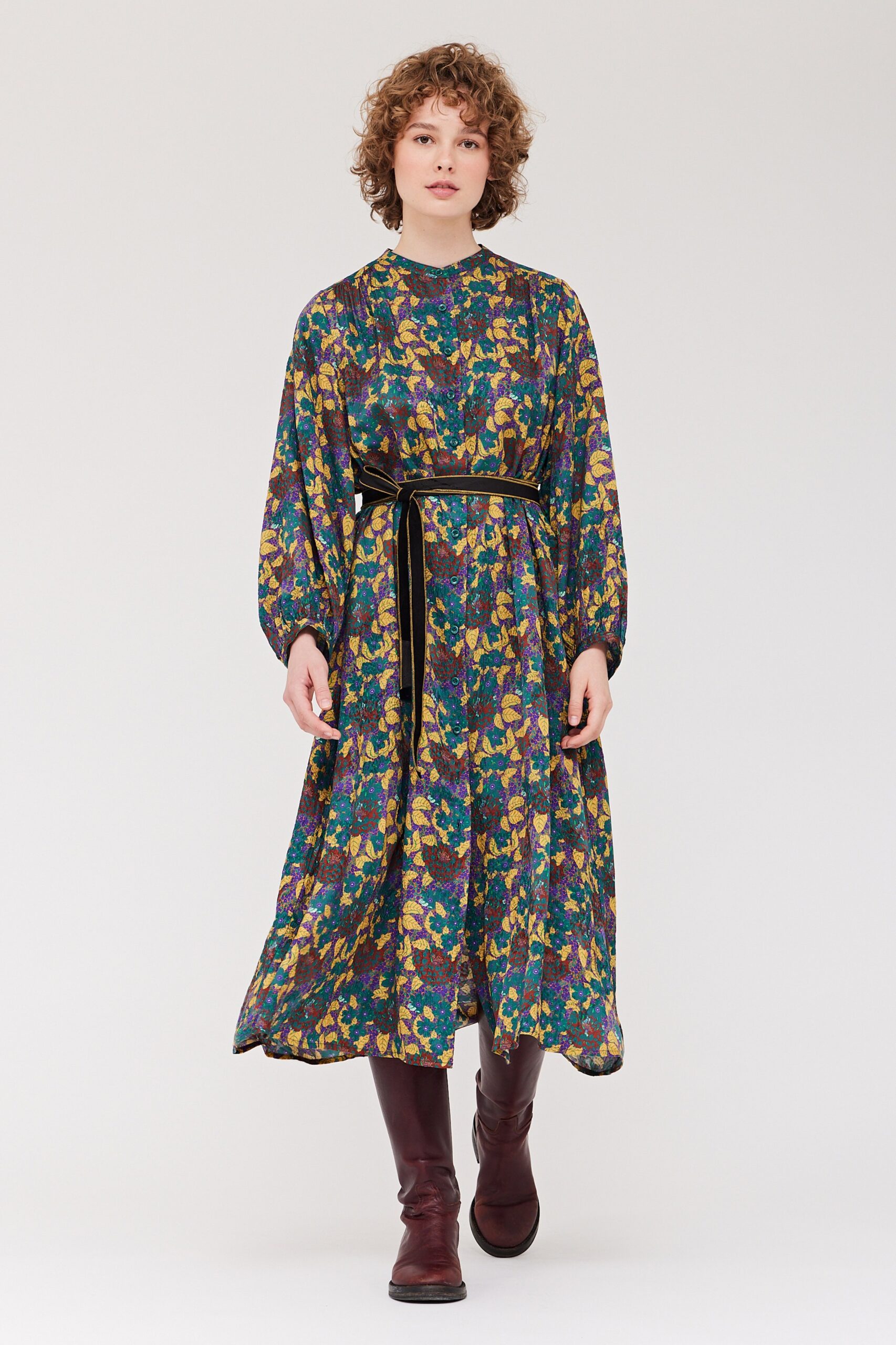 A relaxed multicolor silk dress with long sleeves and a flared silhouette.