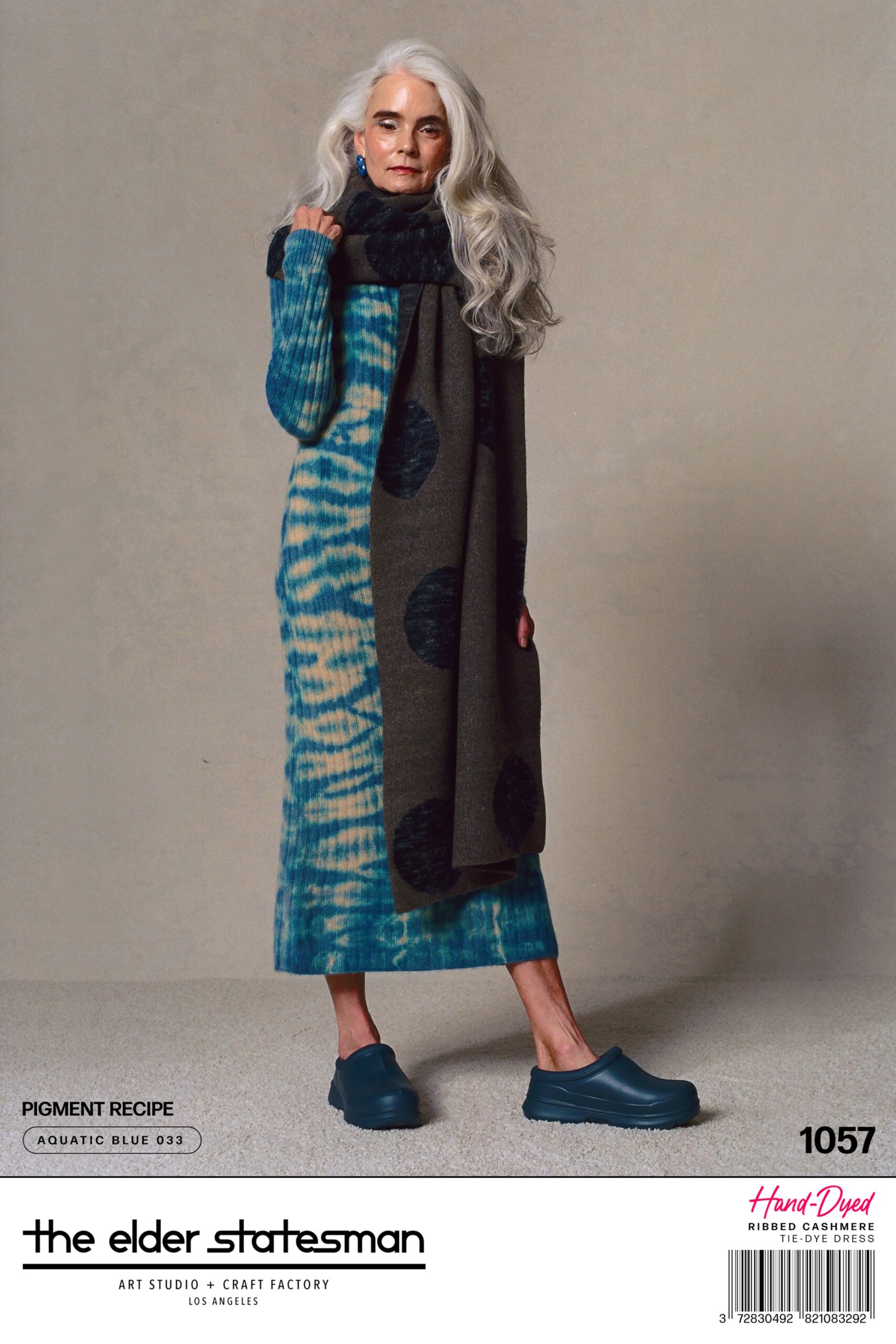 A fitted blue striped long-sleeve dress with a high neckline.
