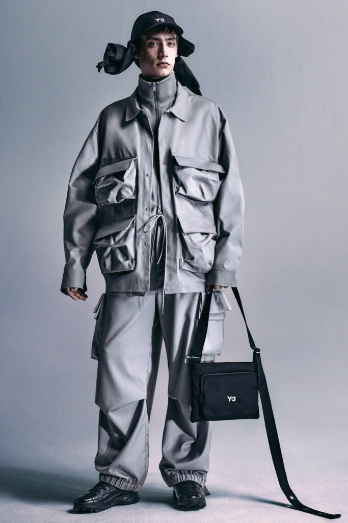 A relaxed gray jacket with long sleeves and collared design paired with matching pants.