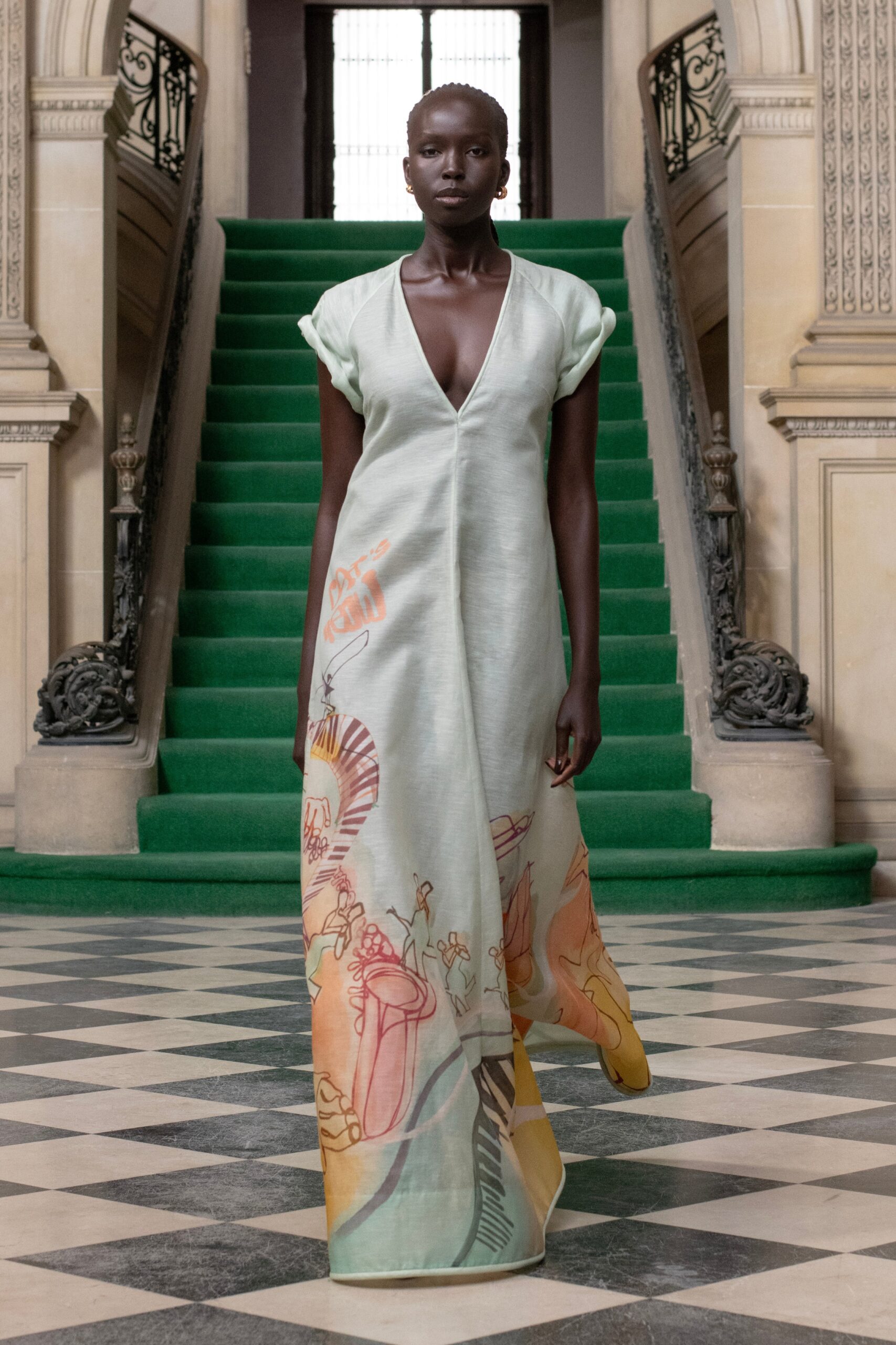A relaxed multicolor silk sleeveless dress with a V-neckline and asymmetric design.