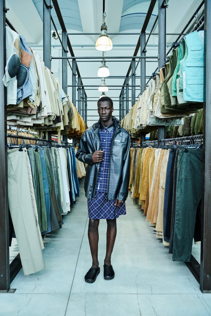 black leather jacket and blue shirt-dress