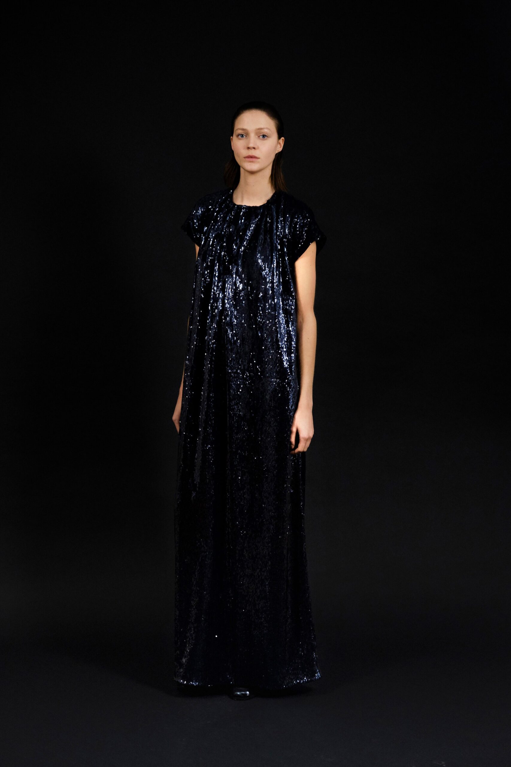 black sequin sleeveless gown