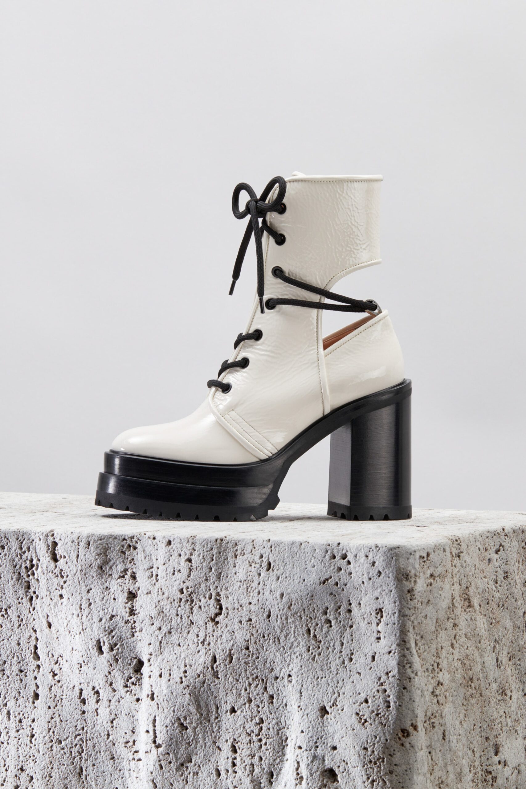 white leather lace-up shoes