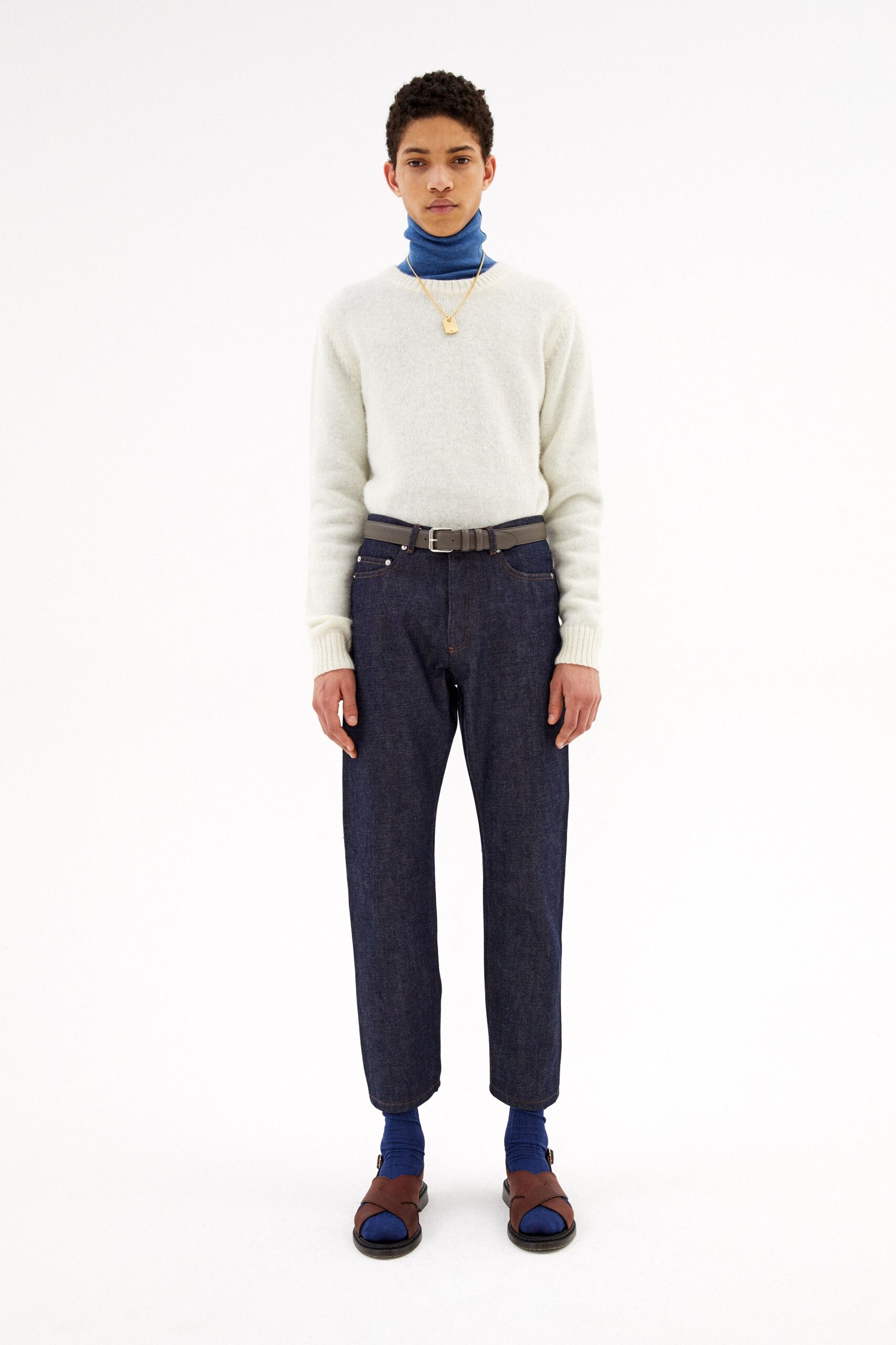 white wool sweater with blue turtleneck