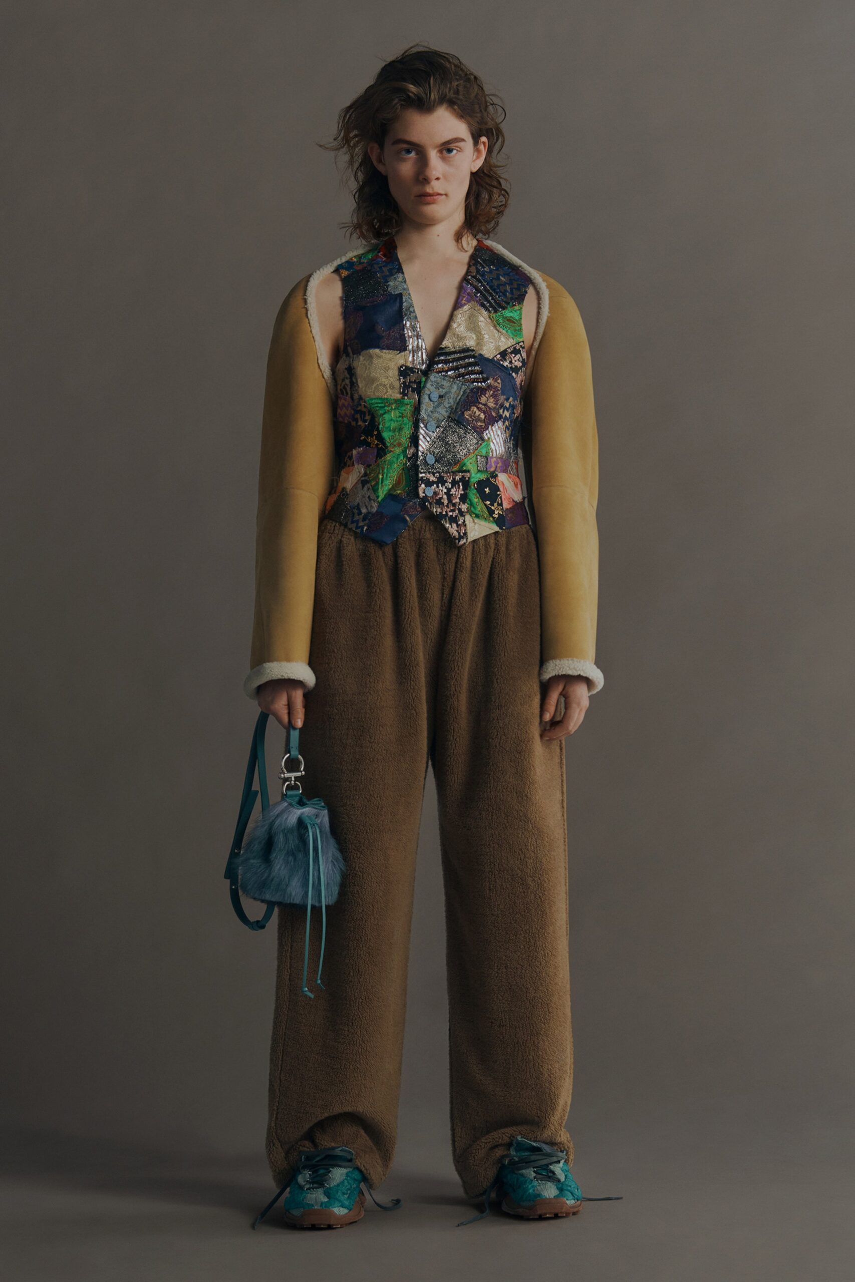multi-colored patchwork vest and relaxed pants