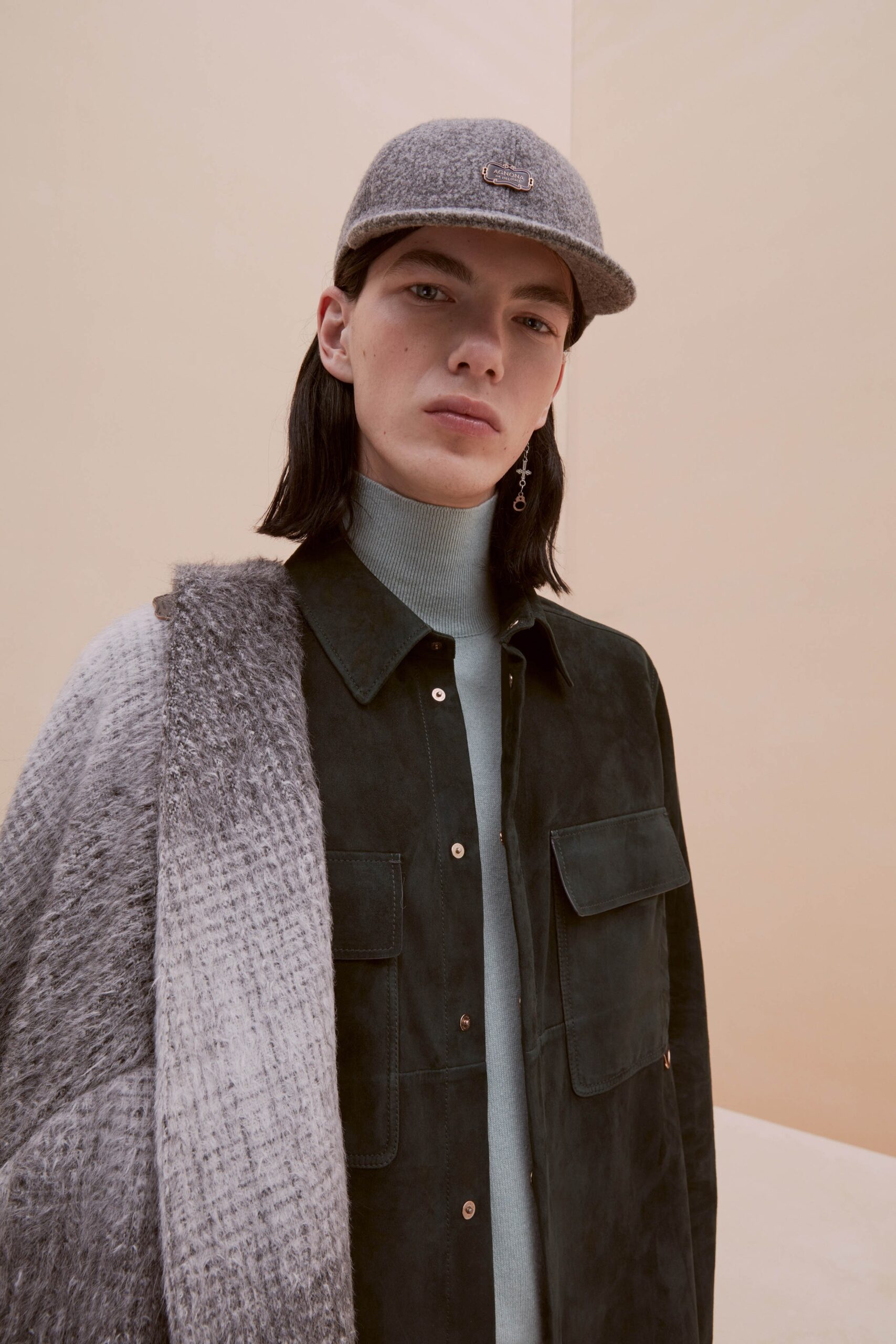 black suede shirt with gray cape