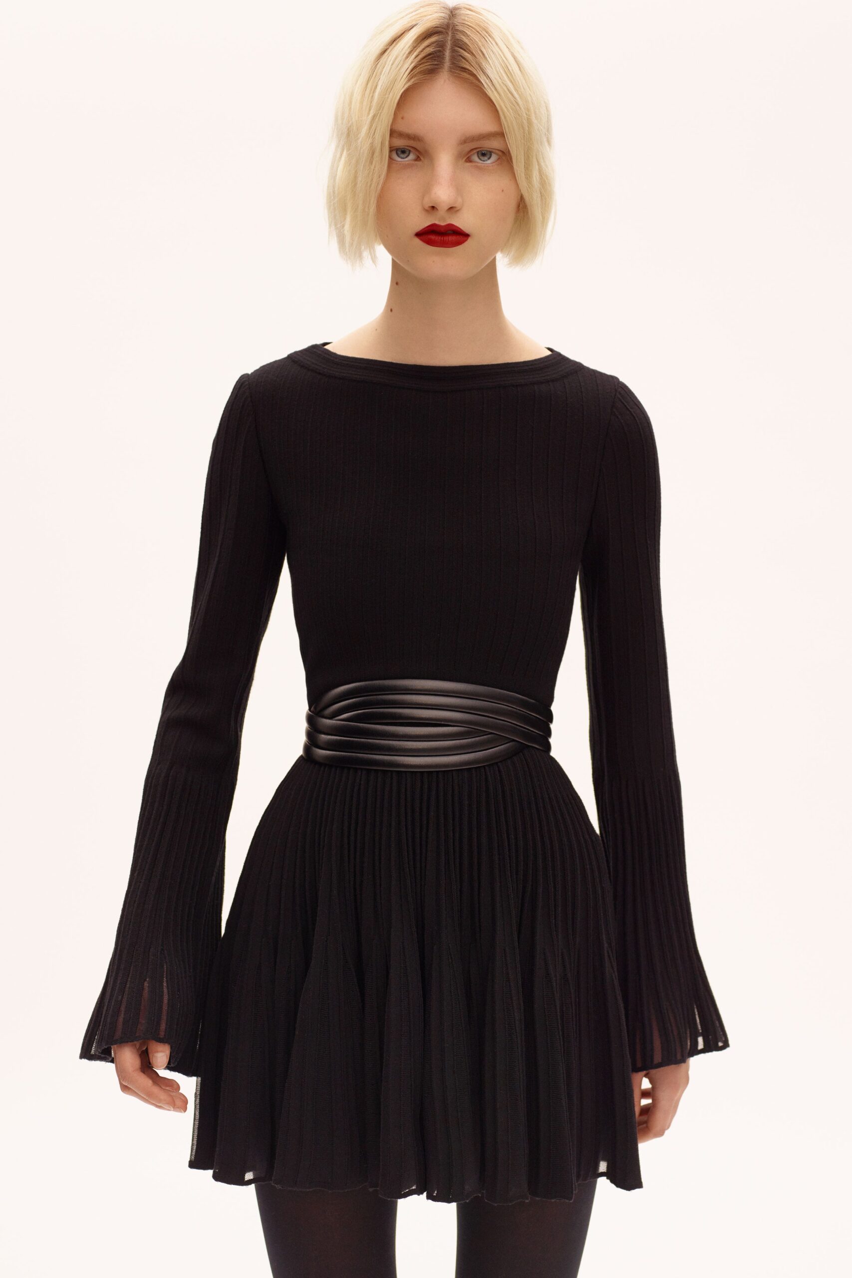 black fitted pleated mini dress