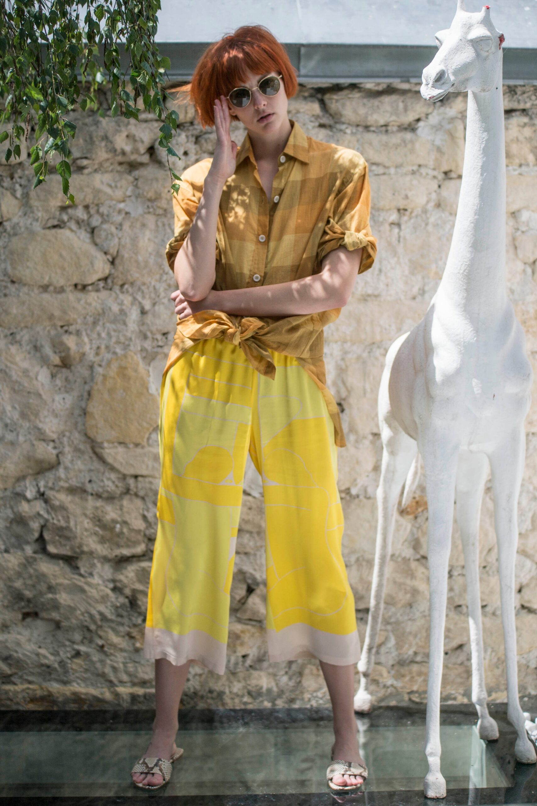brown checked shirt with yellow pants