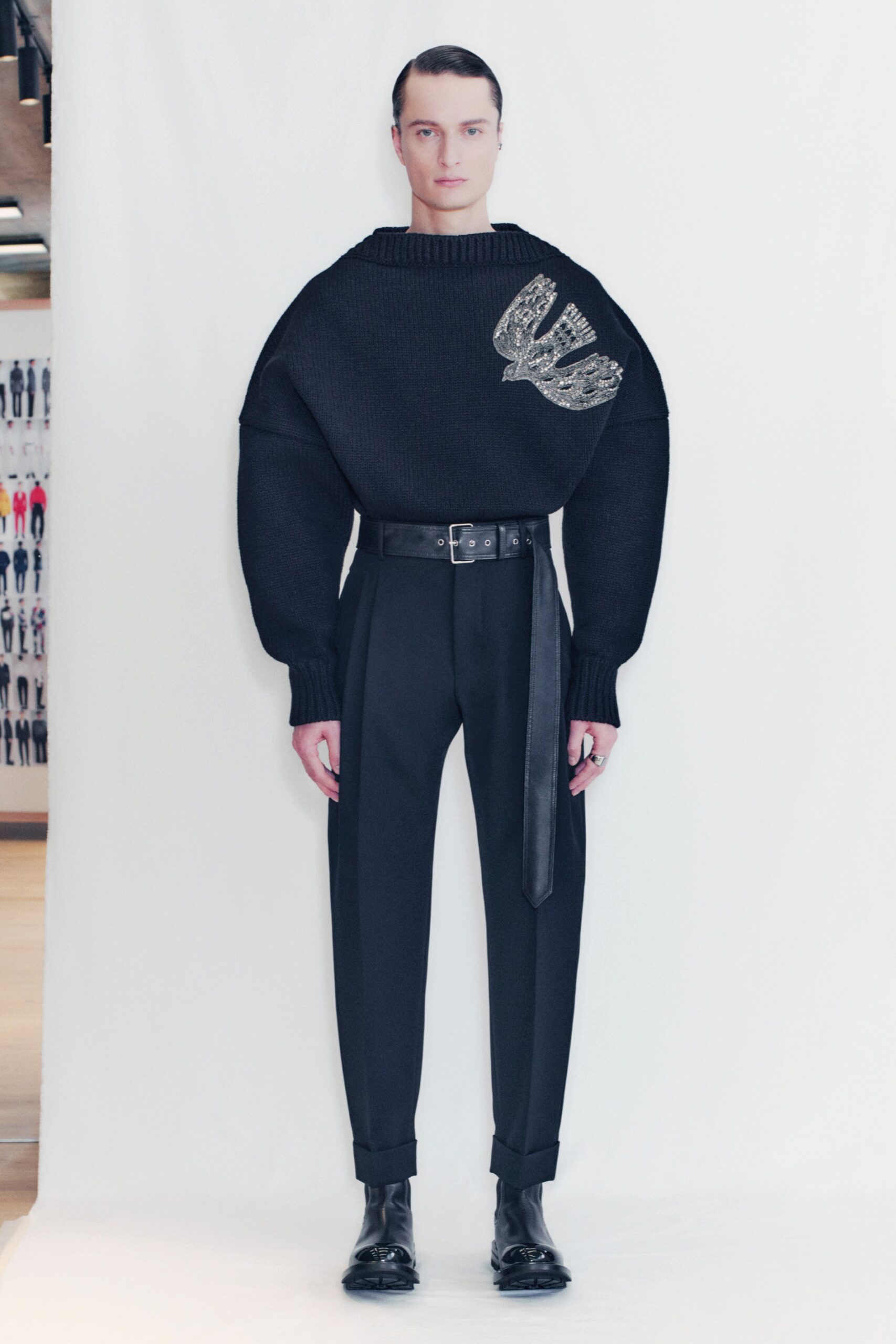 black oversized sweater with tailored pants