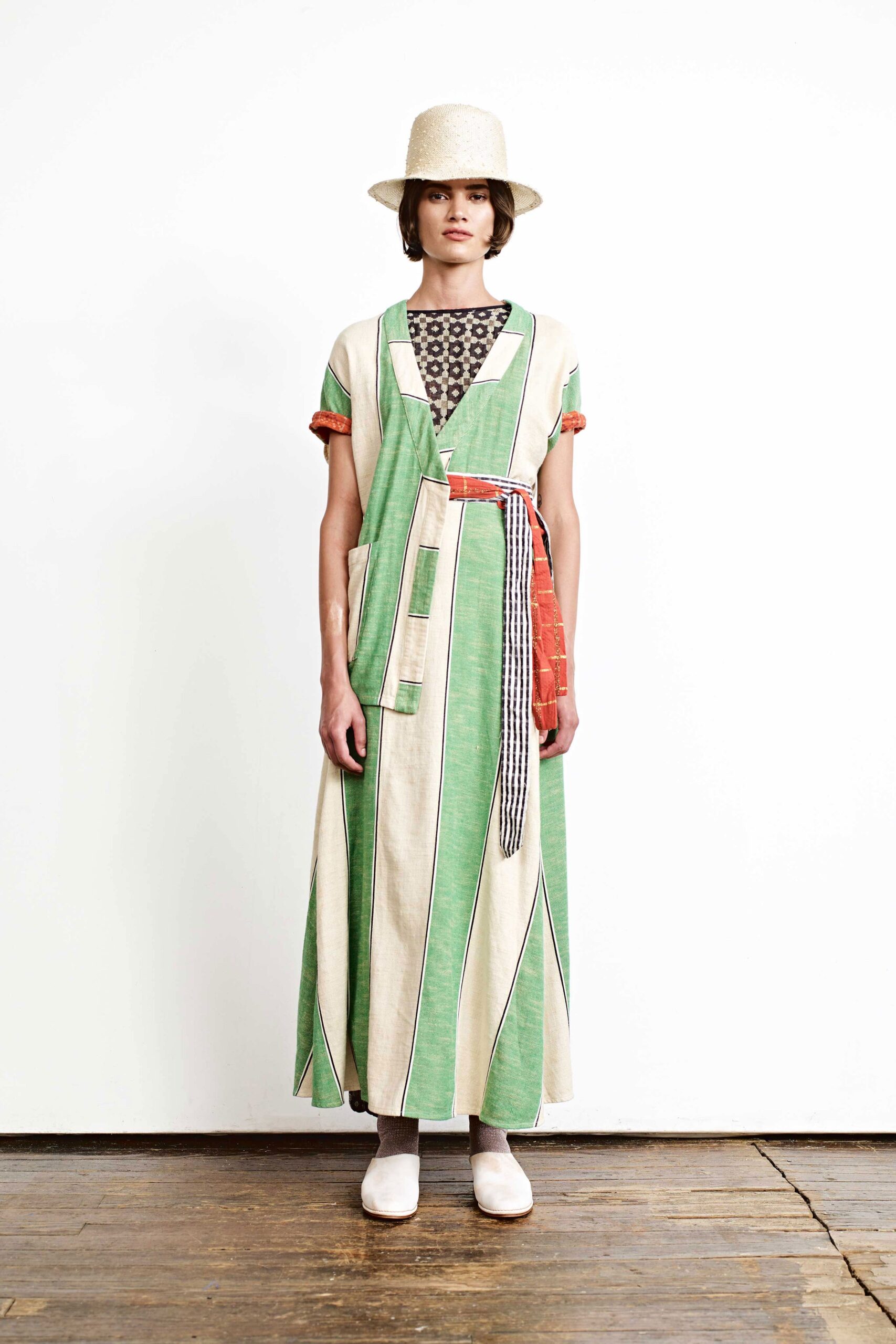 green and beige striped maxi dress with hat