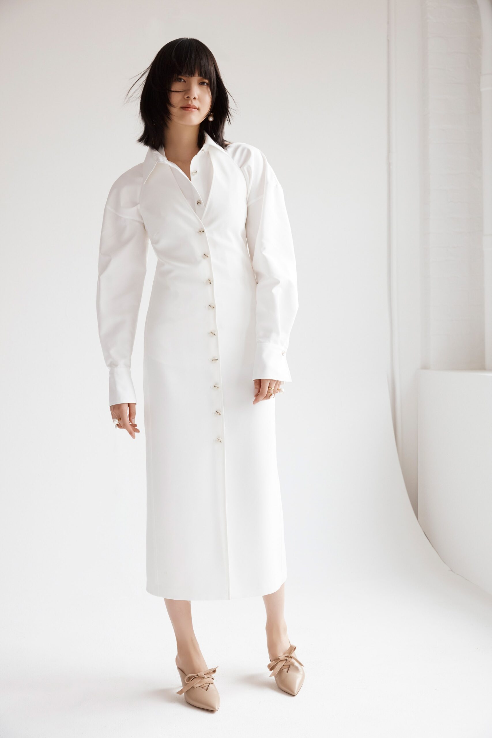 white fitted midi dress with beige shoes